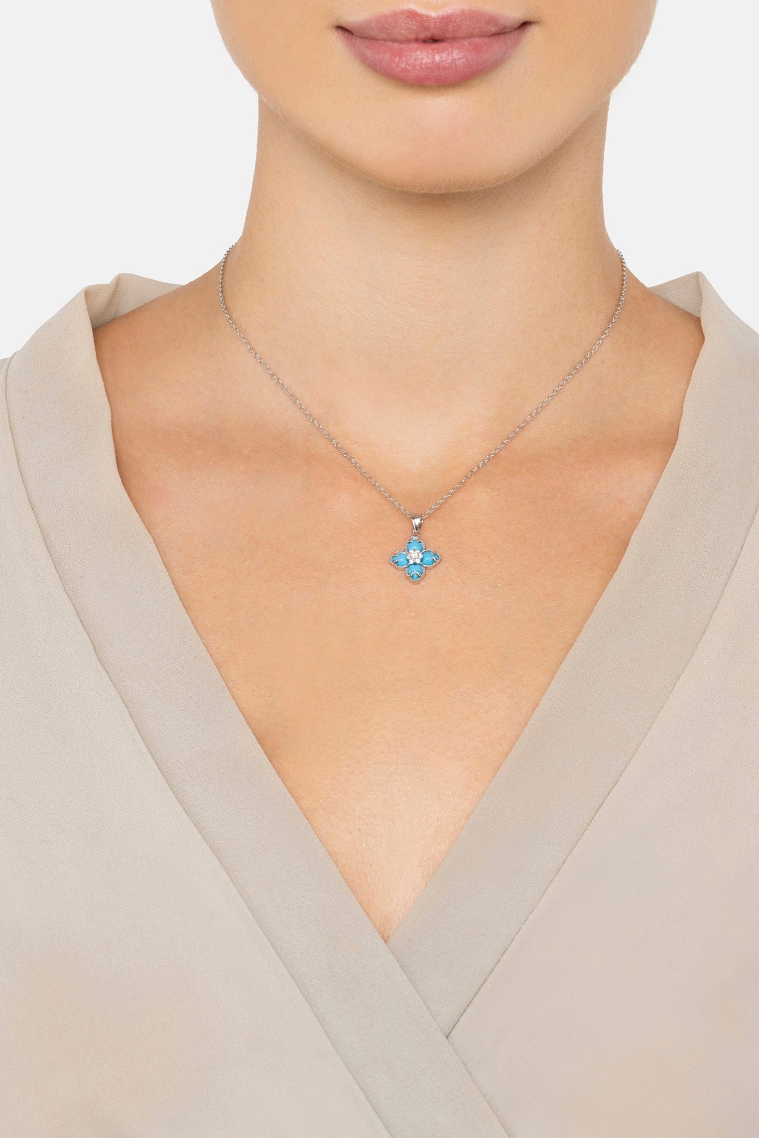 The necklace worn by a model.