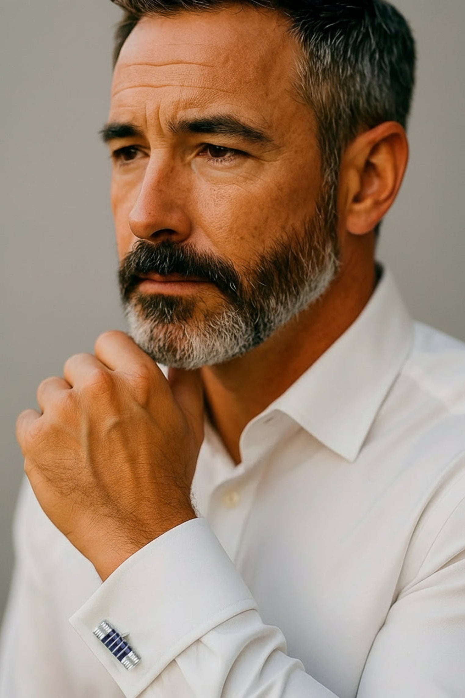The cufflink worn by a model.