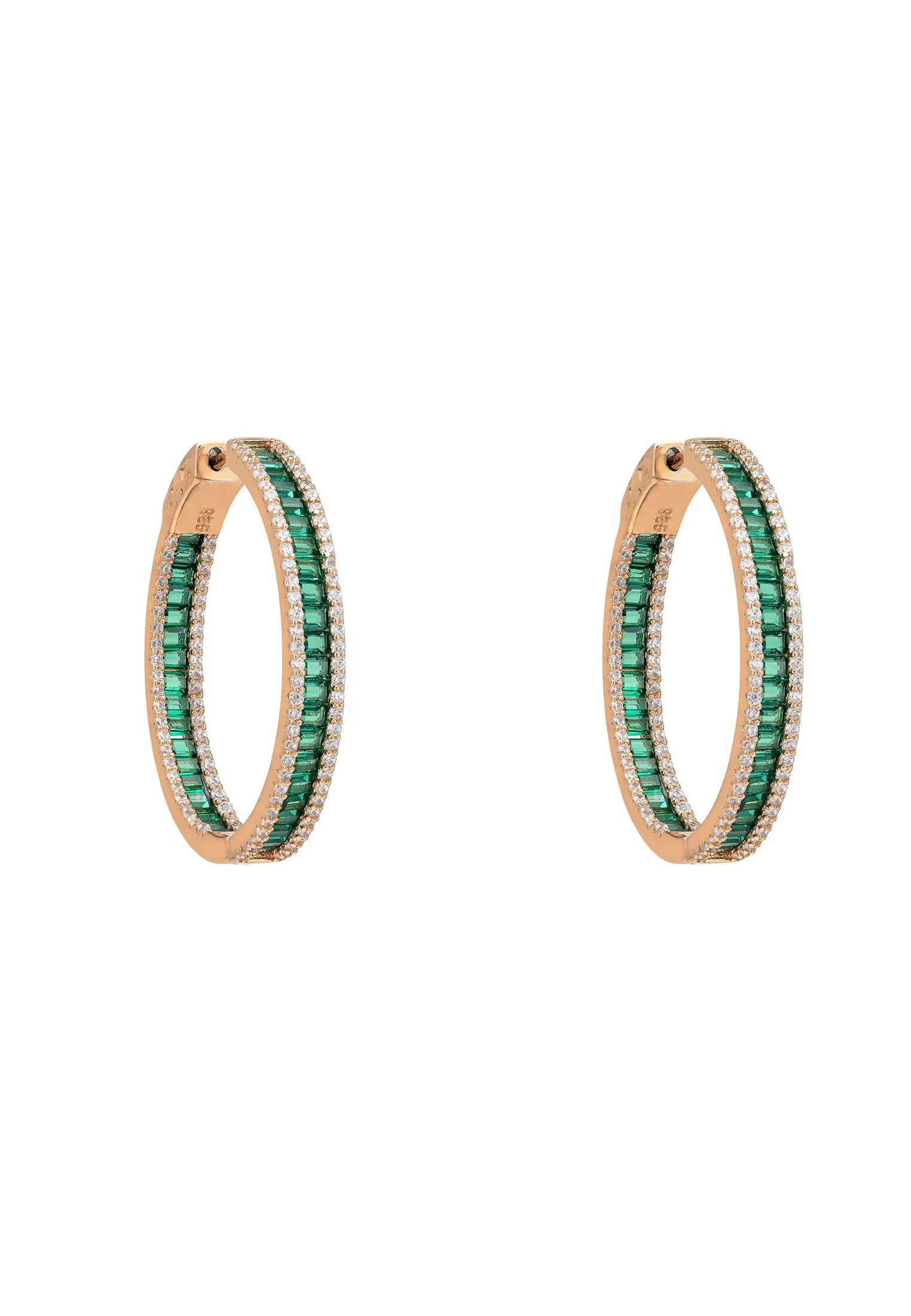 Rose gold emerald hoop earrings.