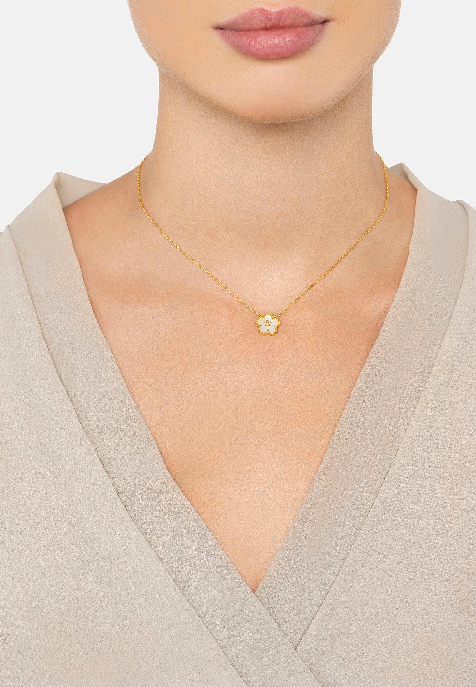 The necklace worn by a model.
