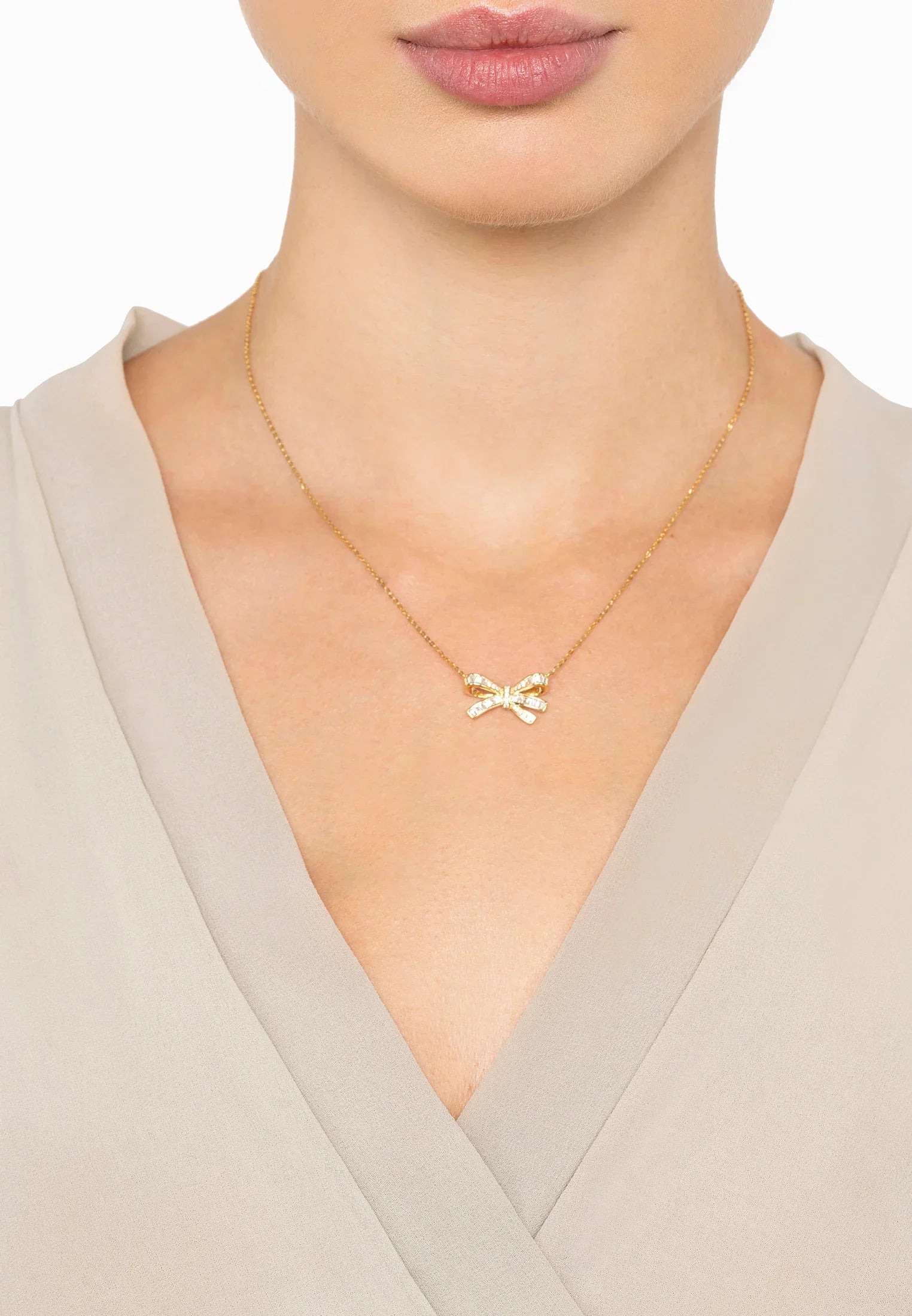 The necklace worn by a model.