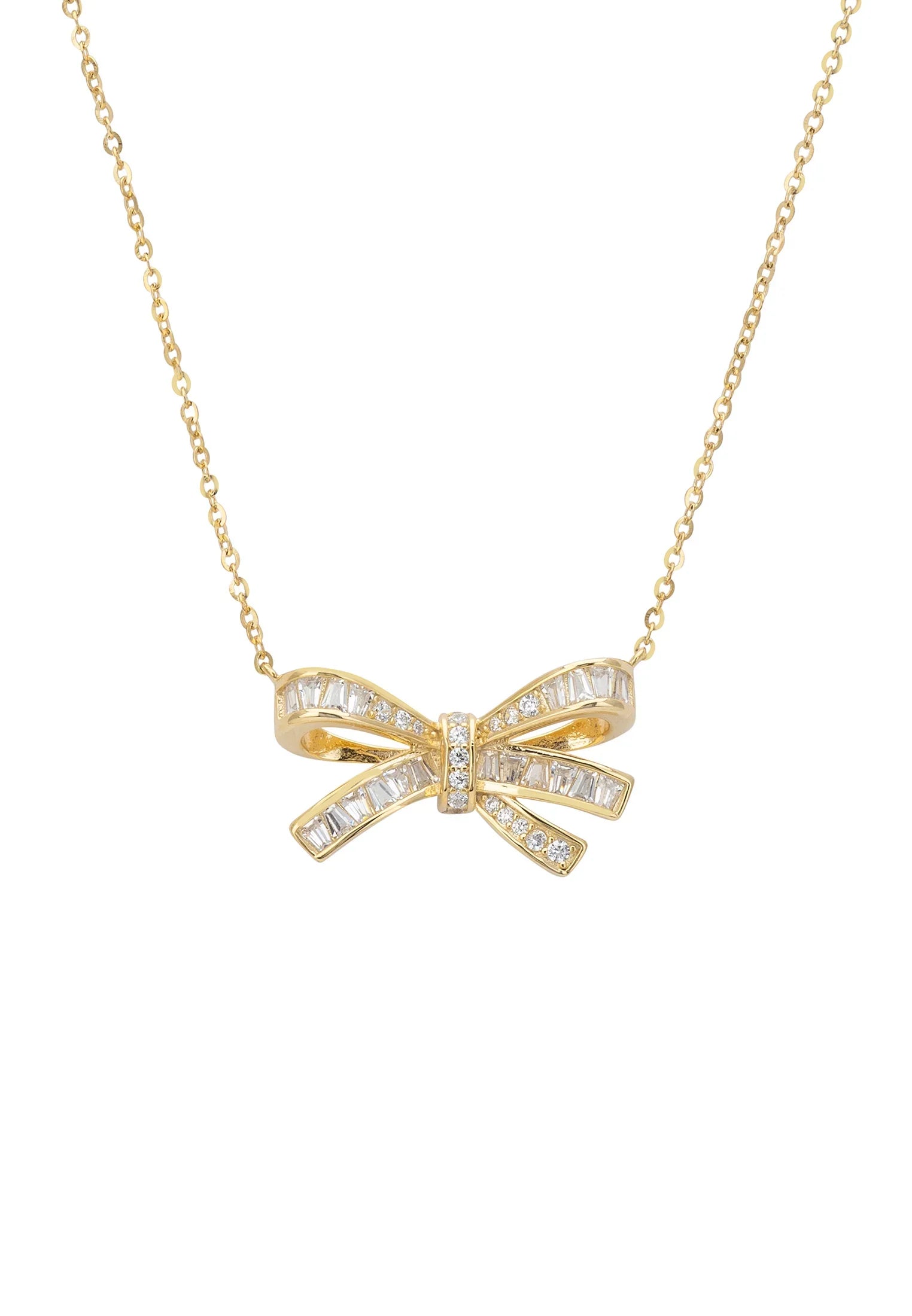 Close-up of the diamond bow gold necklace.