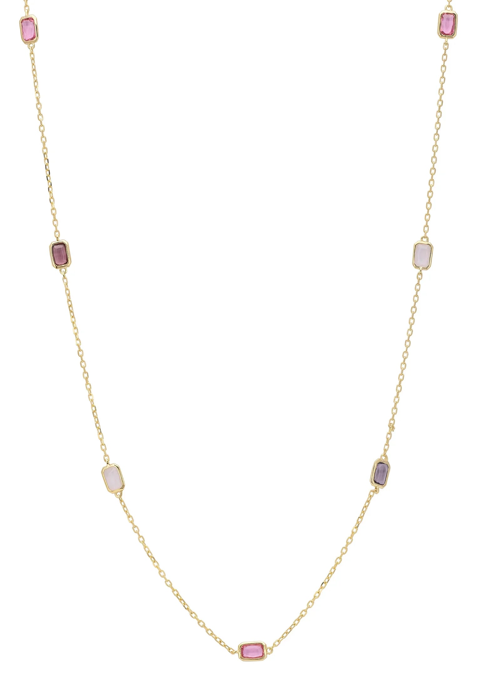 Multiple pink gemstone long gold necklace.