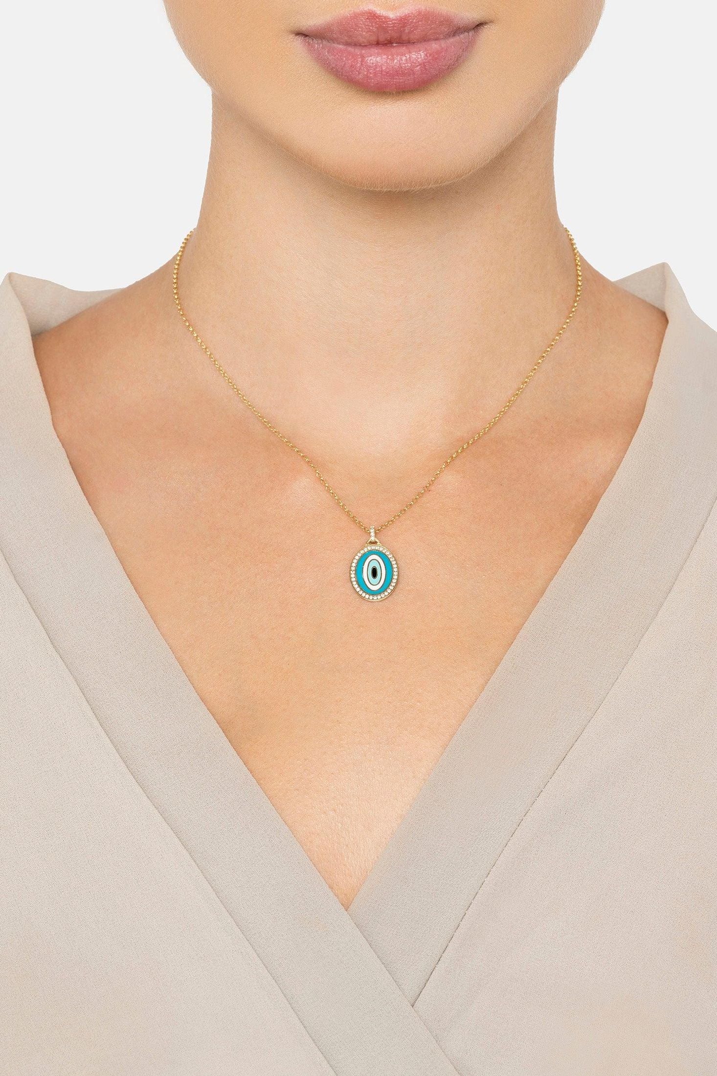 The necklace worn by a model.