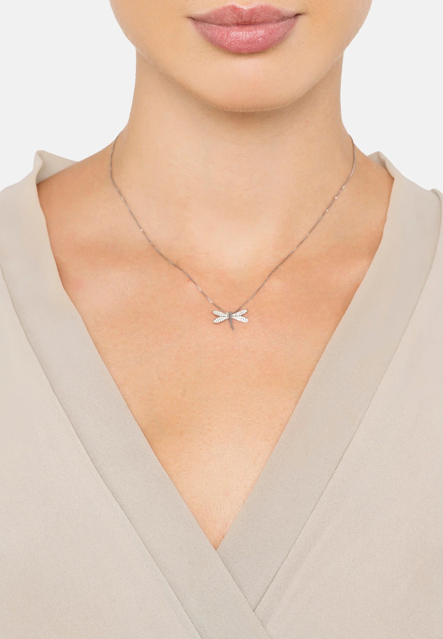 The necklace worn by a model.