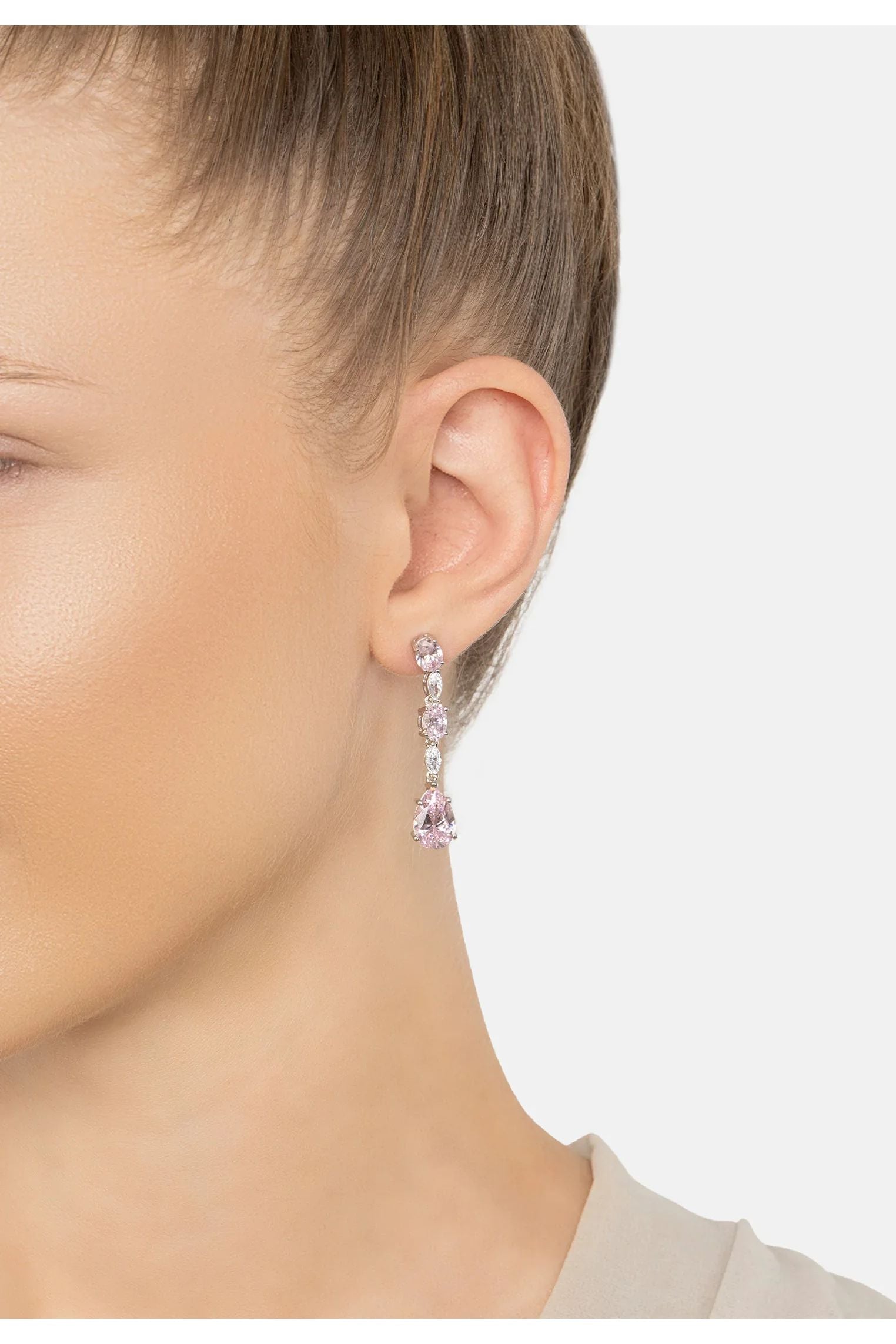 The earring worn by a model.