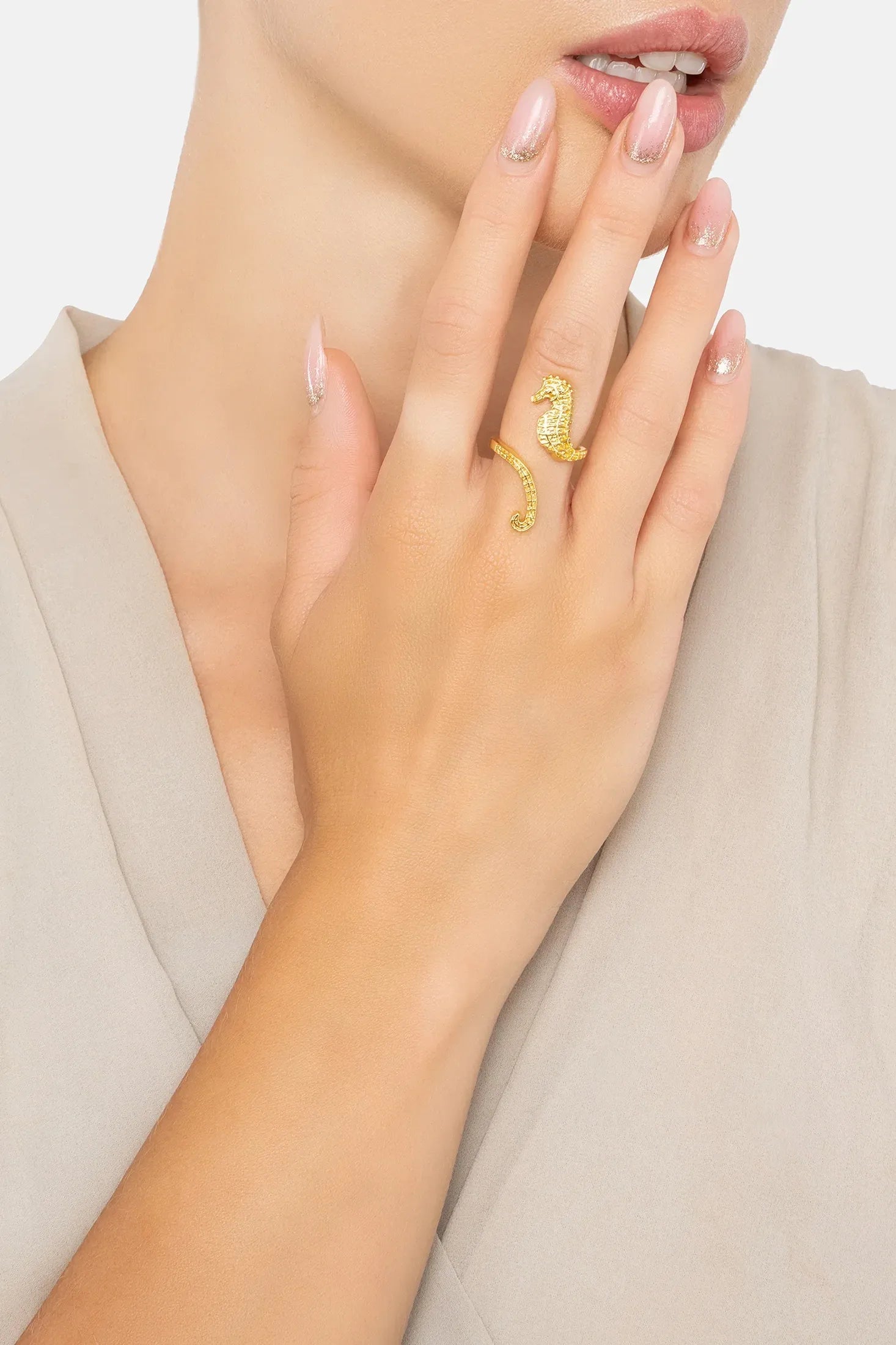 The ring worn by a model.