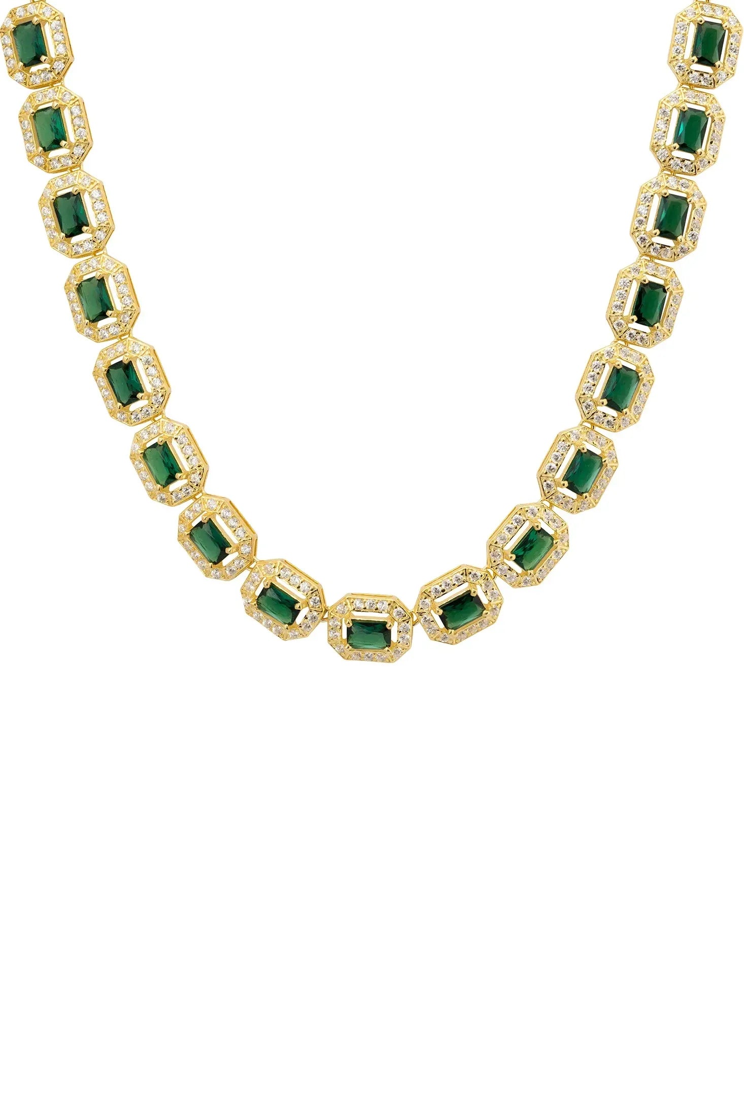 Close-up of the gold and diamond halo emeralds.