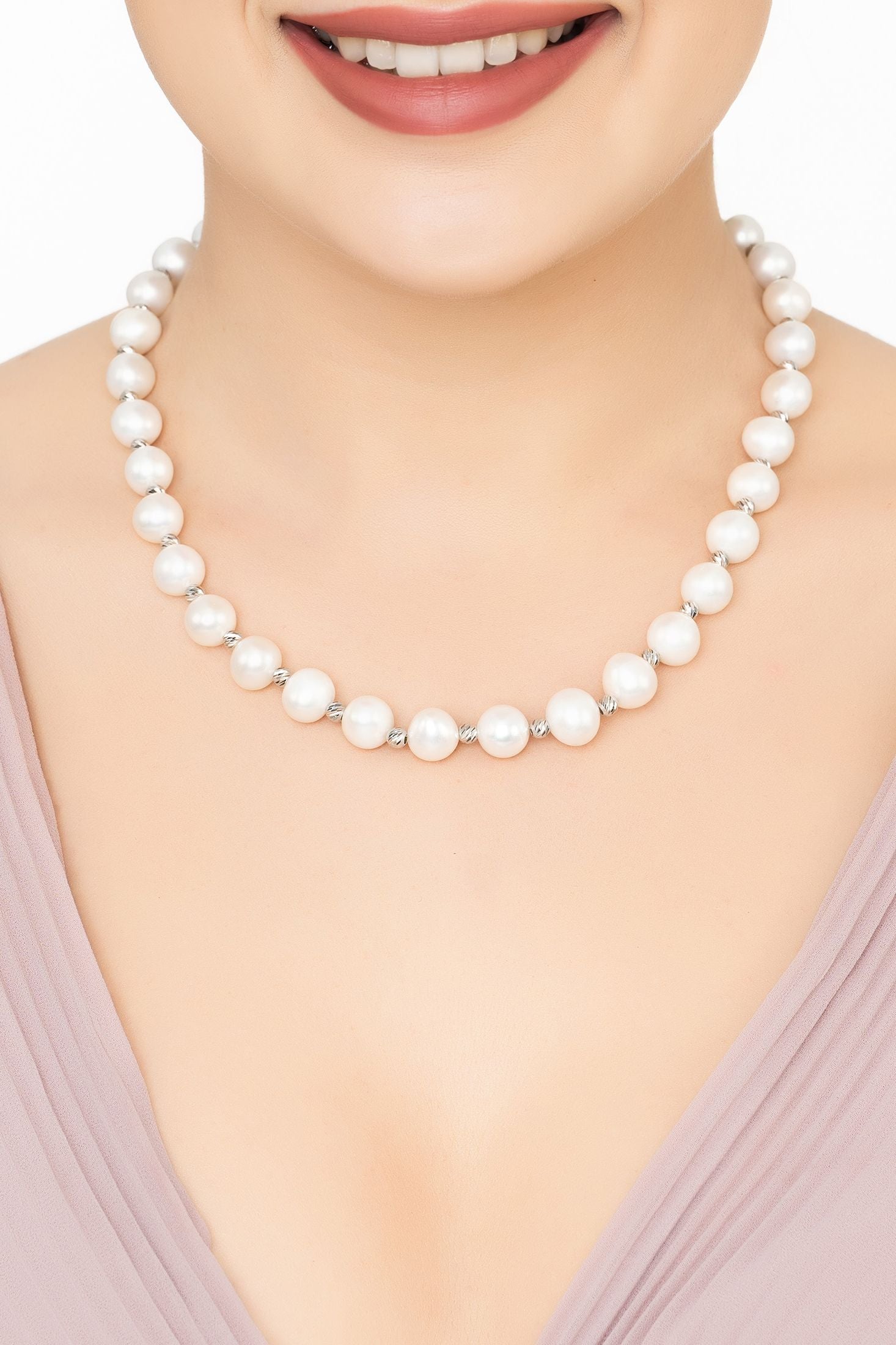 Angled view of Solid 14K White Gold Classic Natural Pearl Necklace, showing pearl detailing, gold finish and the jewellery profile.