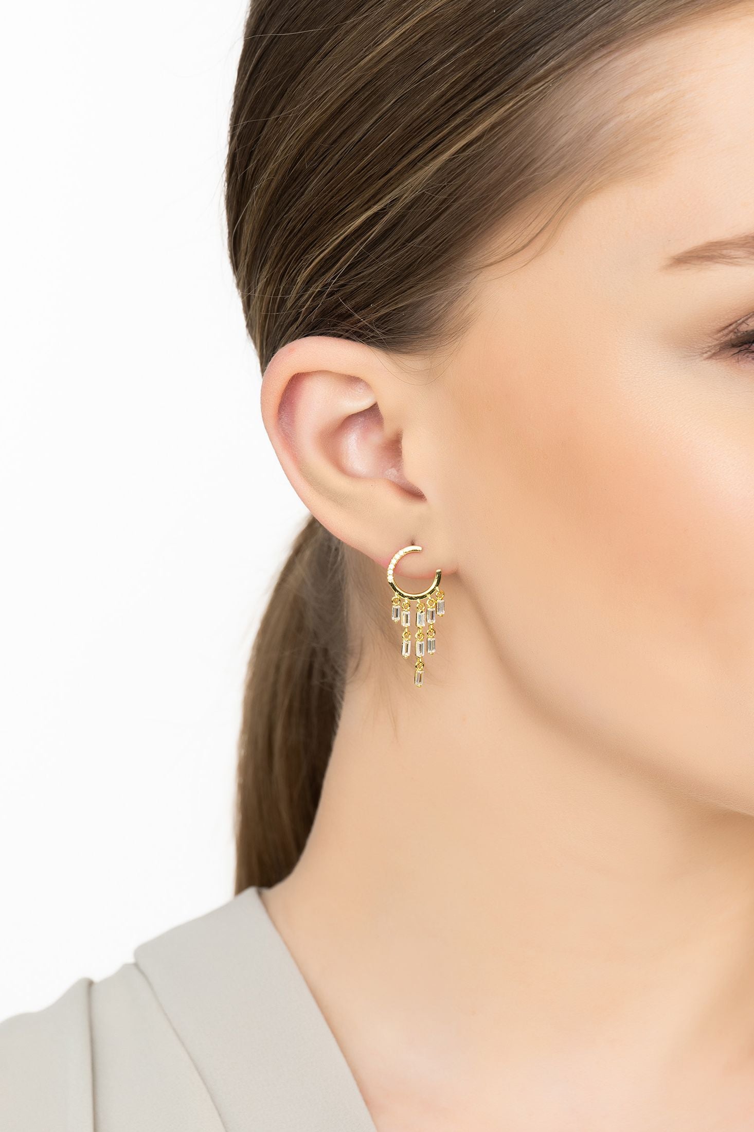 Angled view of Waterfall Cascade Drop Earrings Gold, showing gold finish and the jewellery profile.