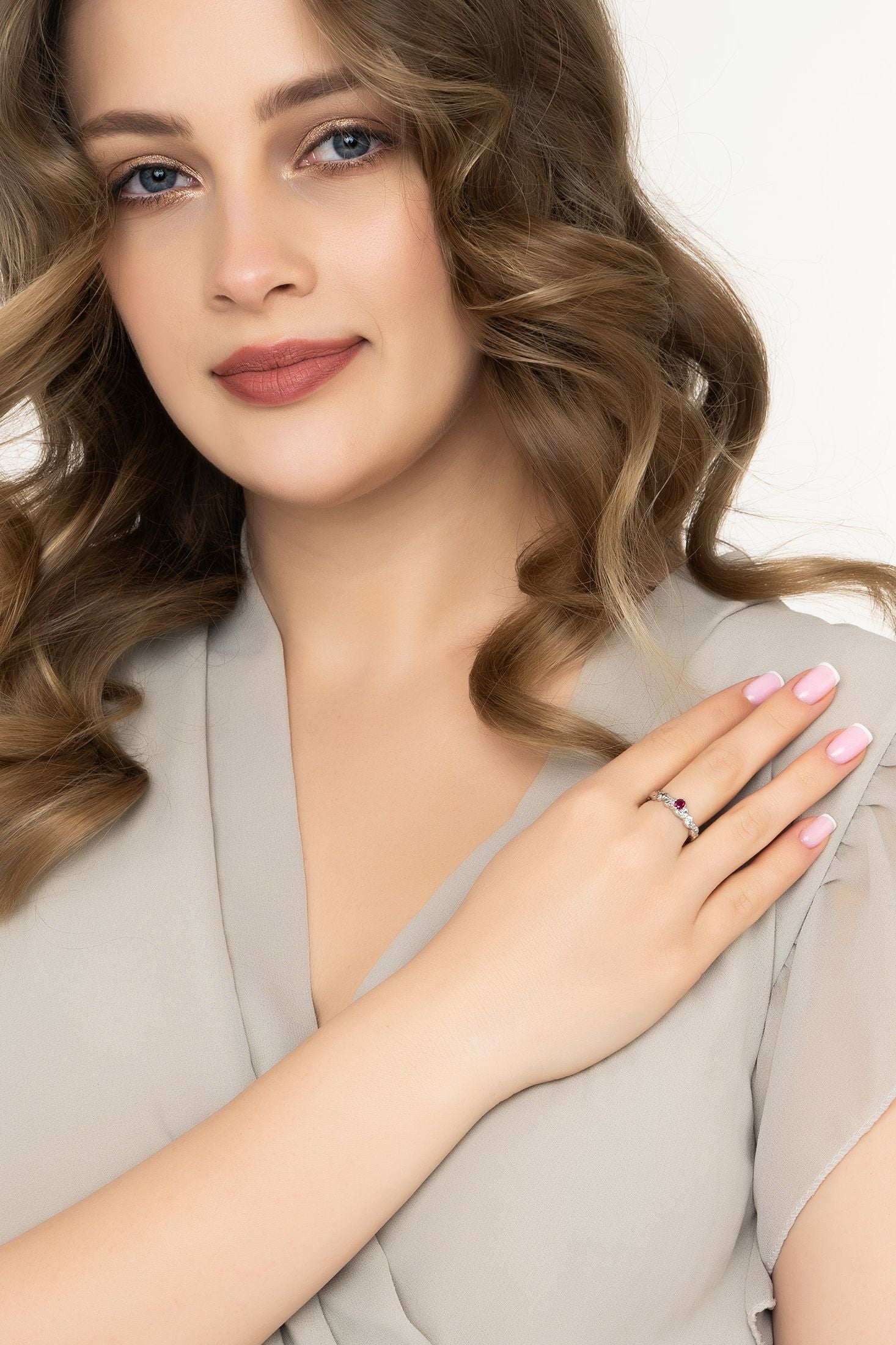 Angled view of Mystical Forest Band Ring Ruby Silver, showing ruby detailing, silver finish and the jewellery profile.
