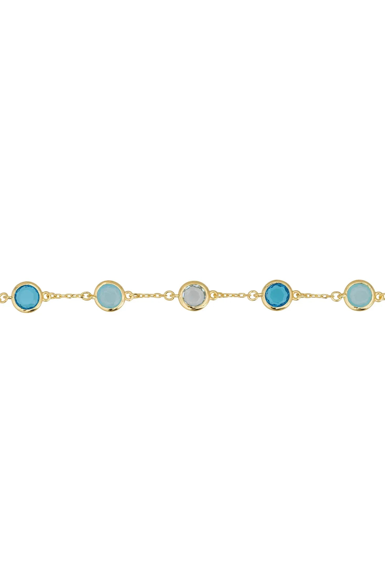 Angled view of Sardinia Bracelet Gold The Blues, showing gold finish and the jewellery profile.