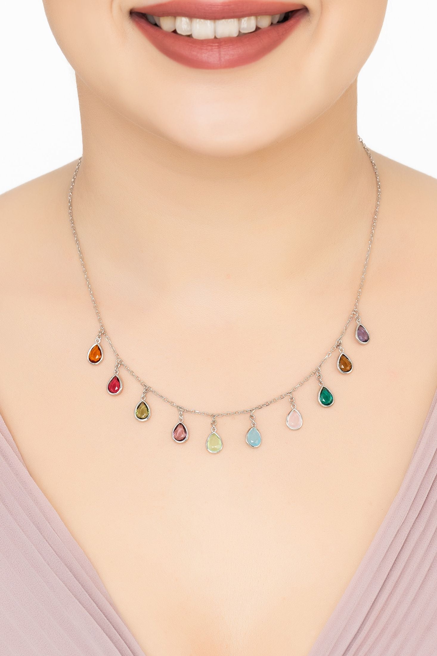 Angled view of Florence Teardrop Gemstone Necklace Silver Multi Coloured, showing silver finish and the jewellery profile.