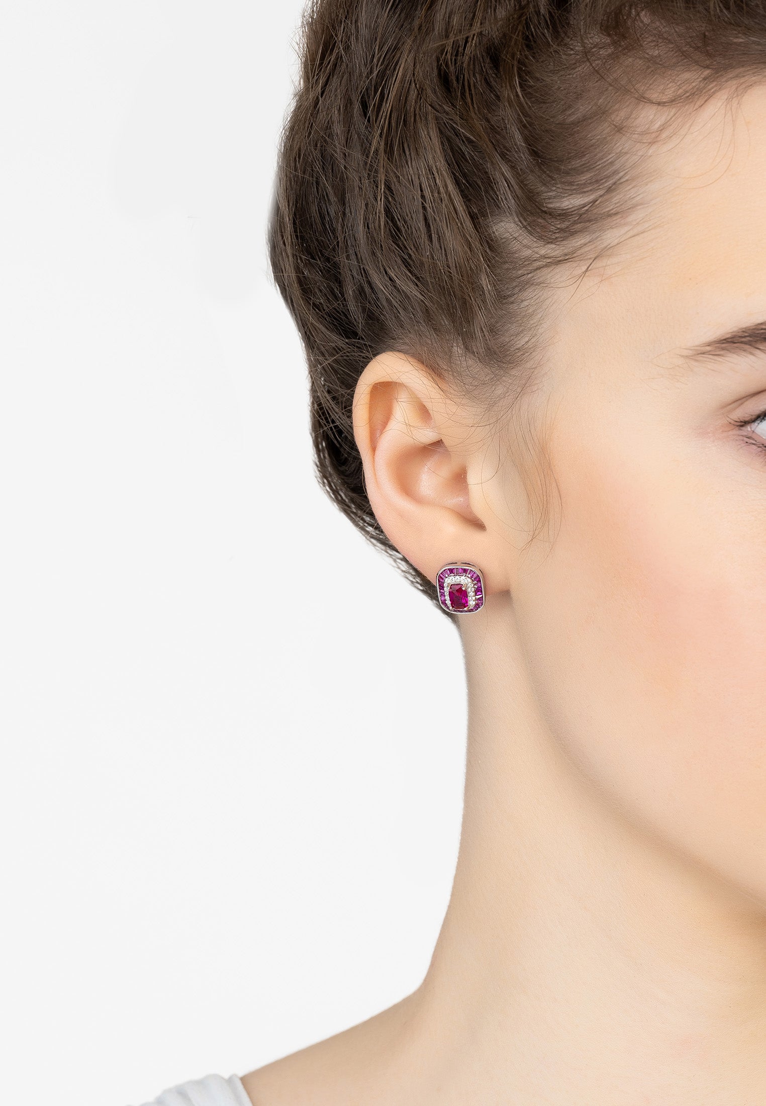 The earring worn by a model.