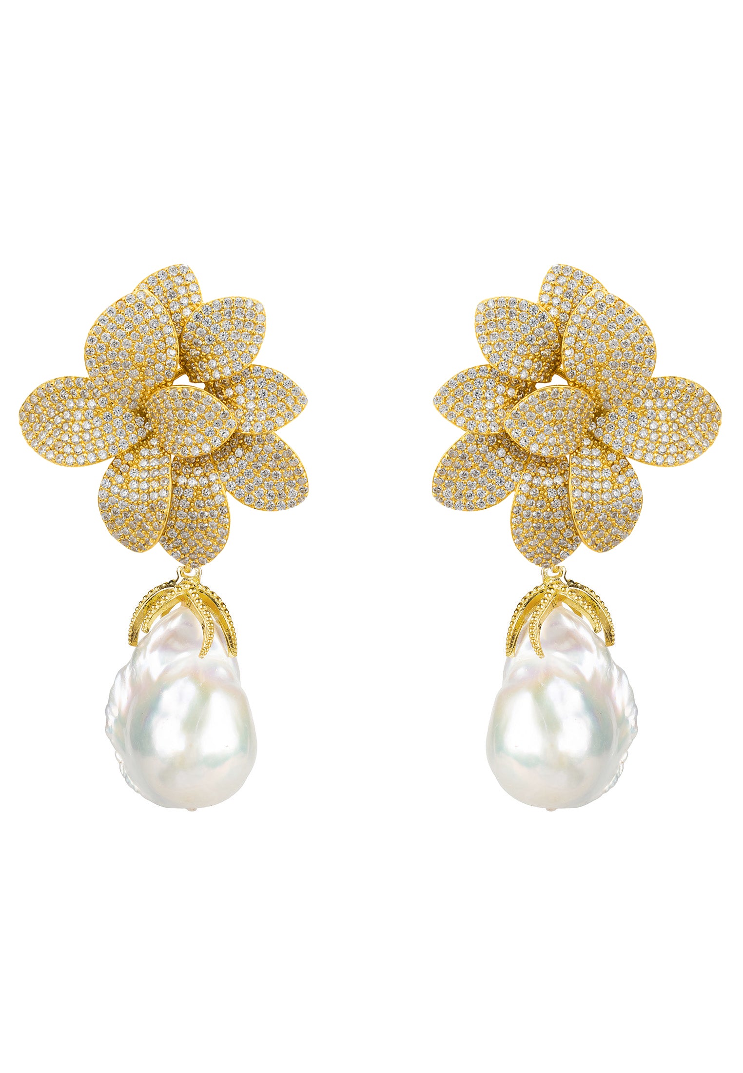 Gold flower-shaped earrings with pearl drops on a white background
