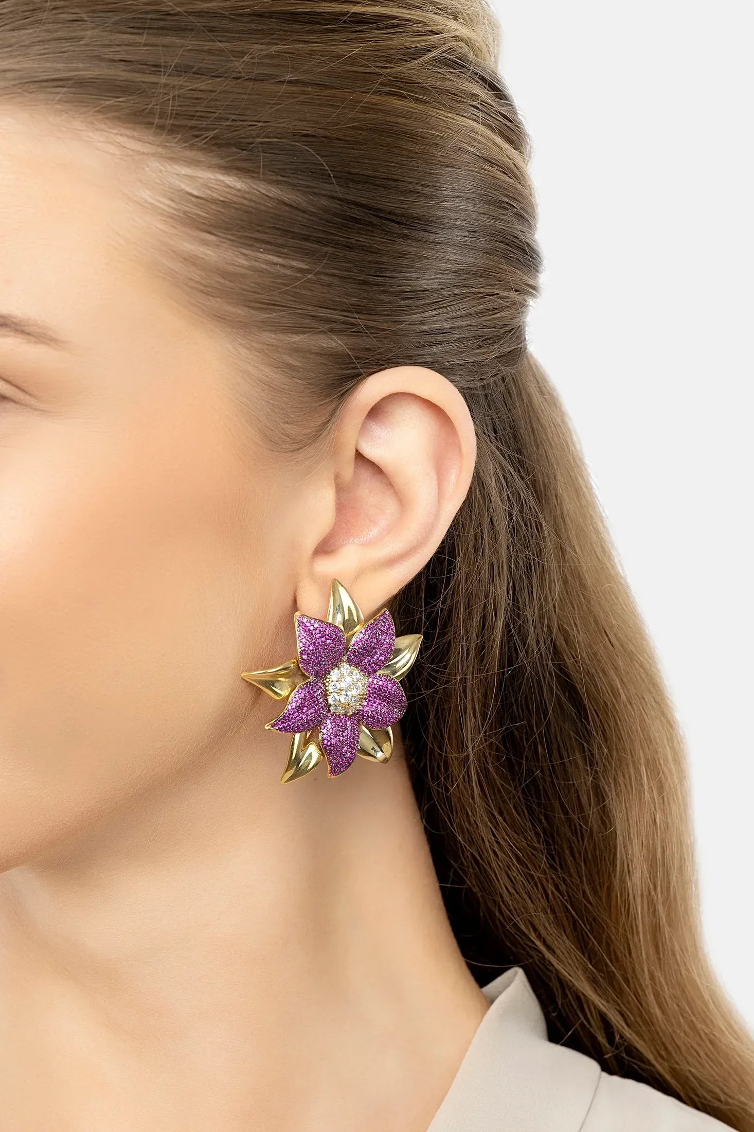 The earring worn by a model.