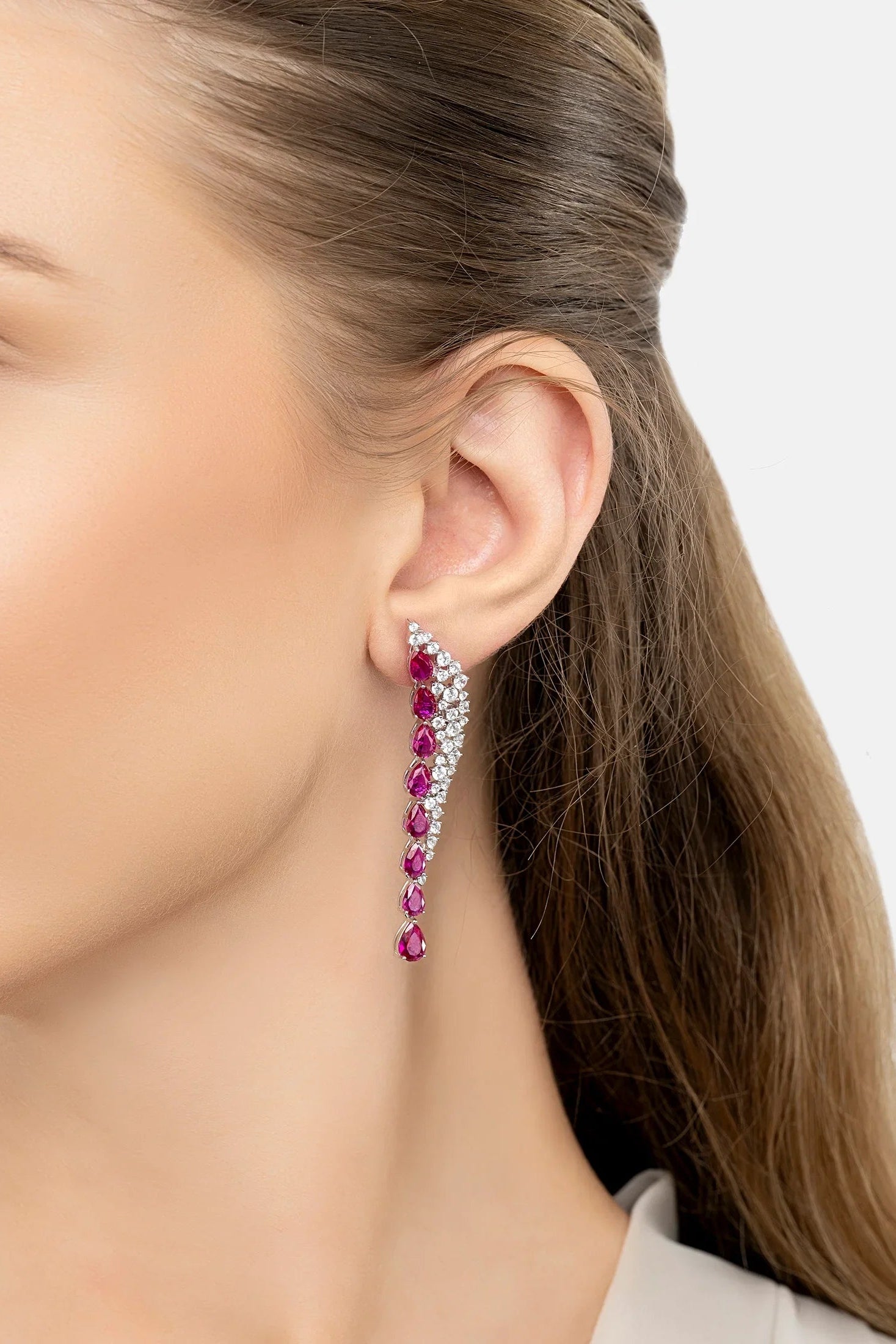 The earring worn by a model.