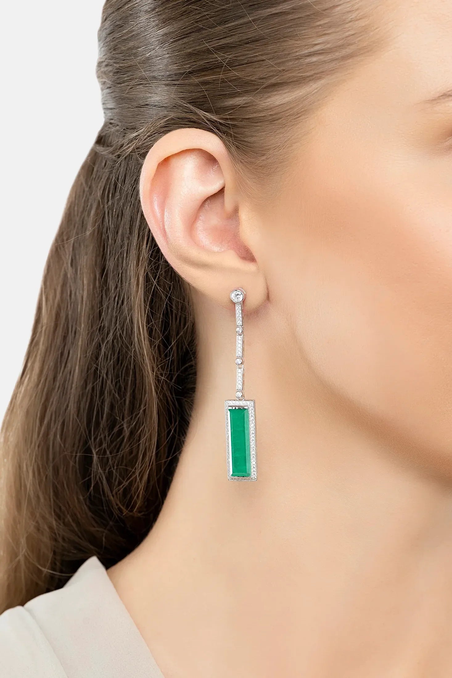 The earring worn by a model.