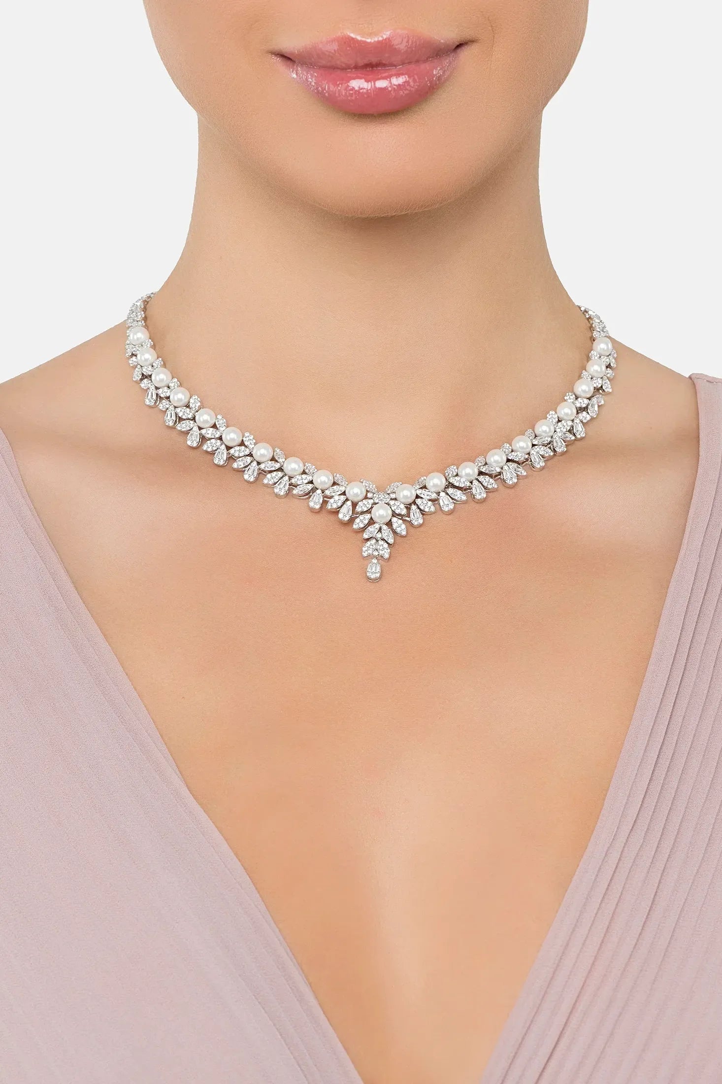 The necklace worn by a model.
