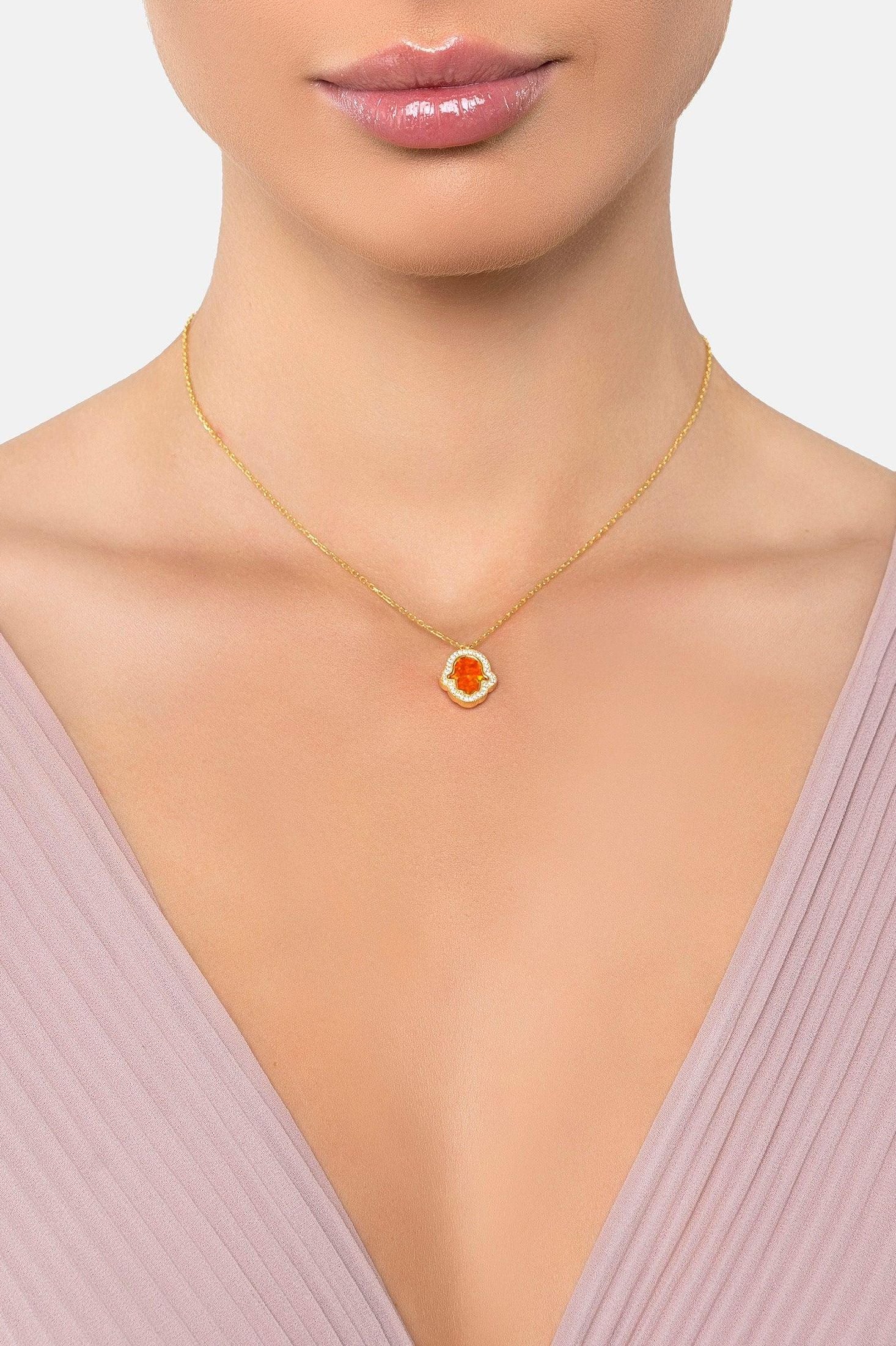 The necklace worn by a model.