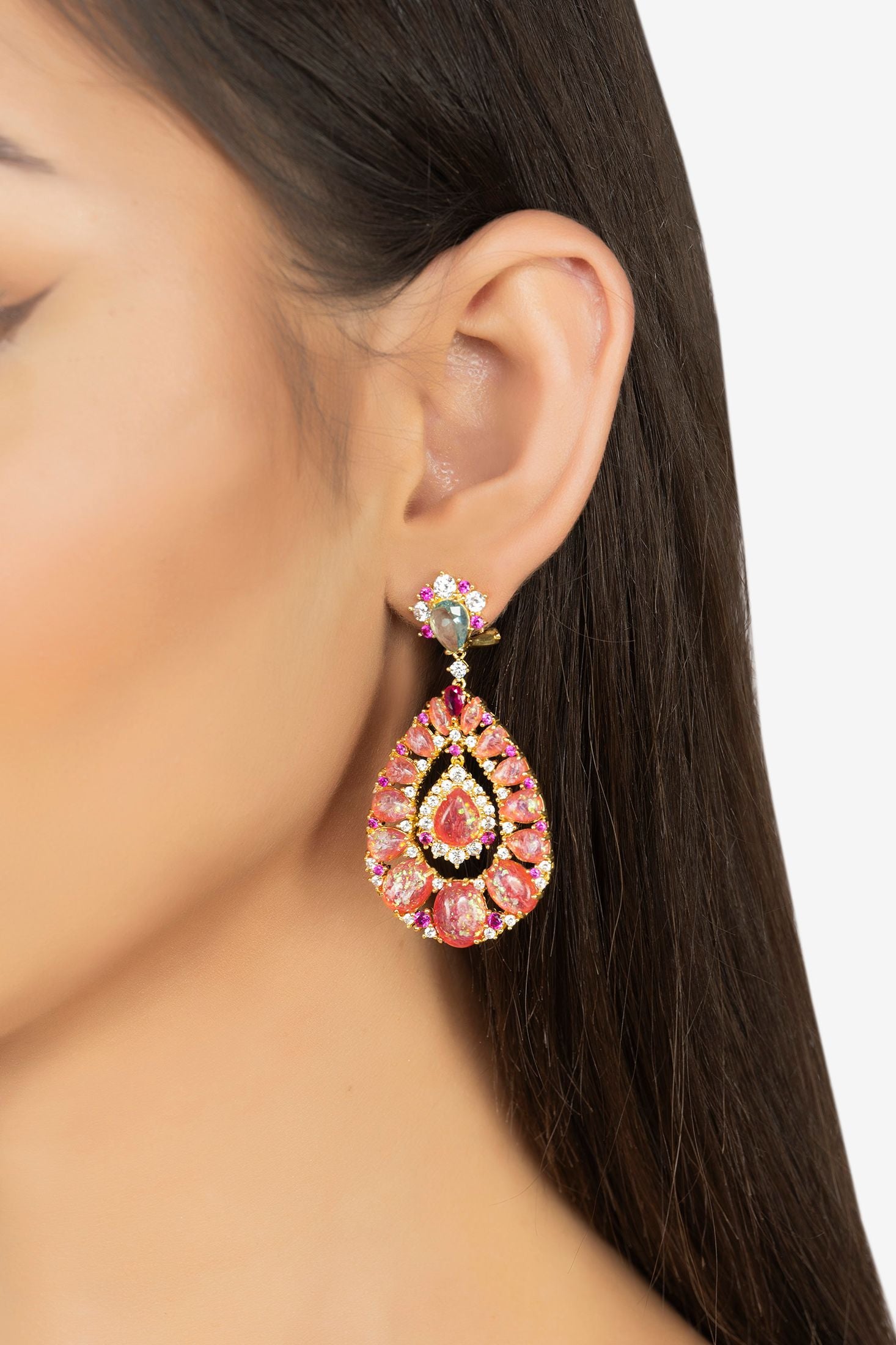 The earring worn by a model.