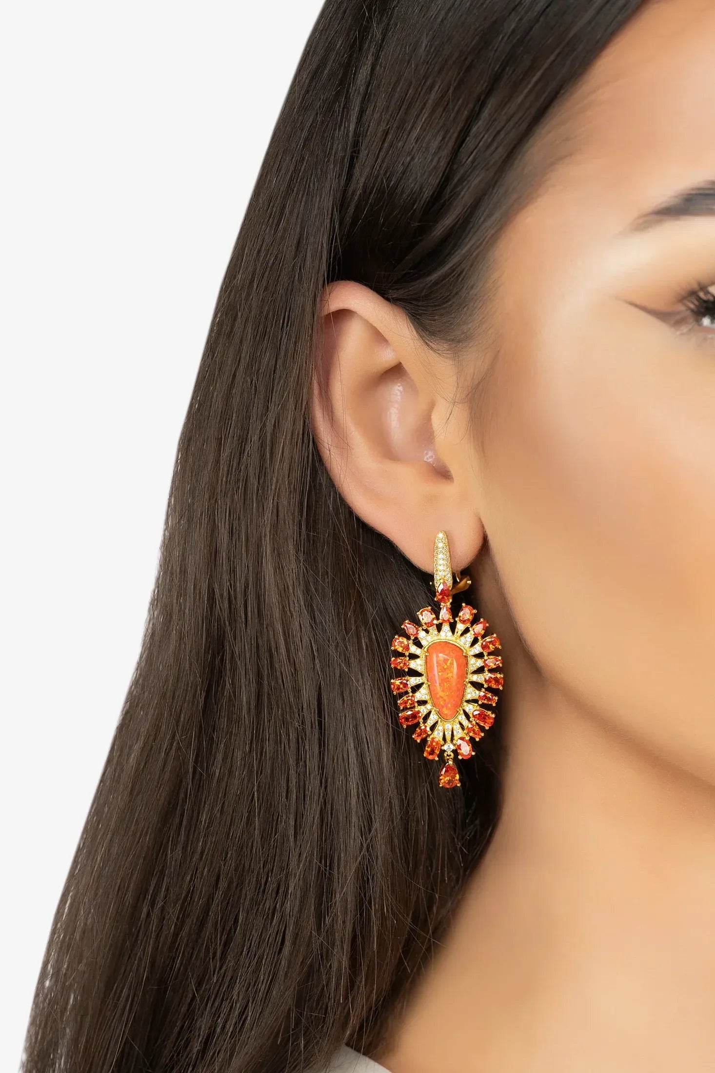The earring worn by a model.