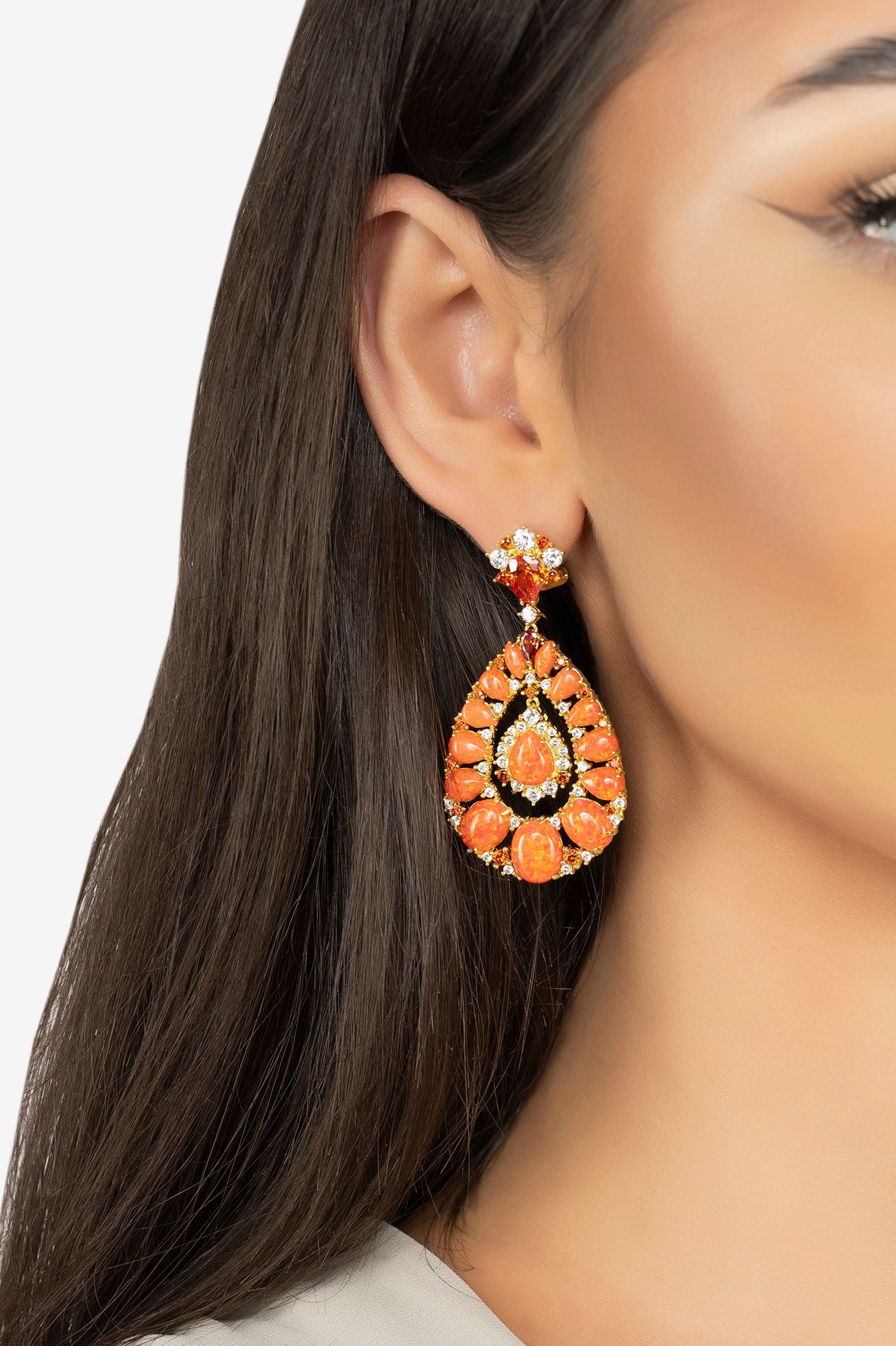 The earring worn by a model.