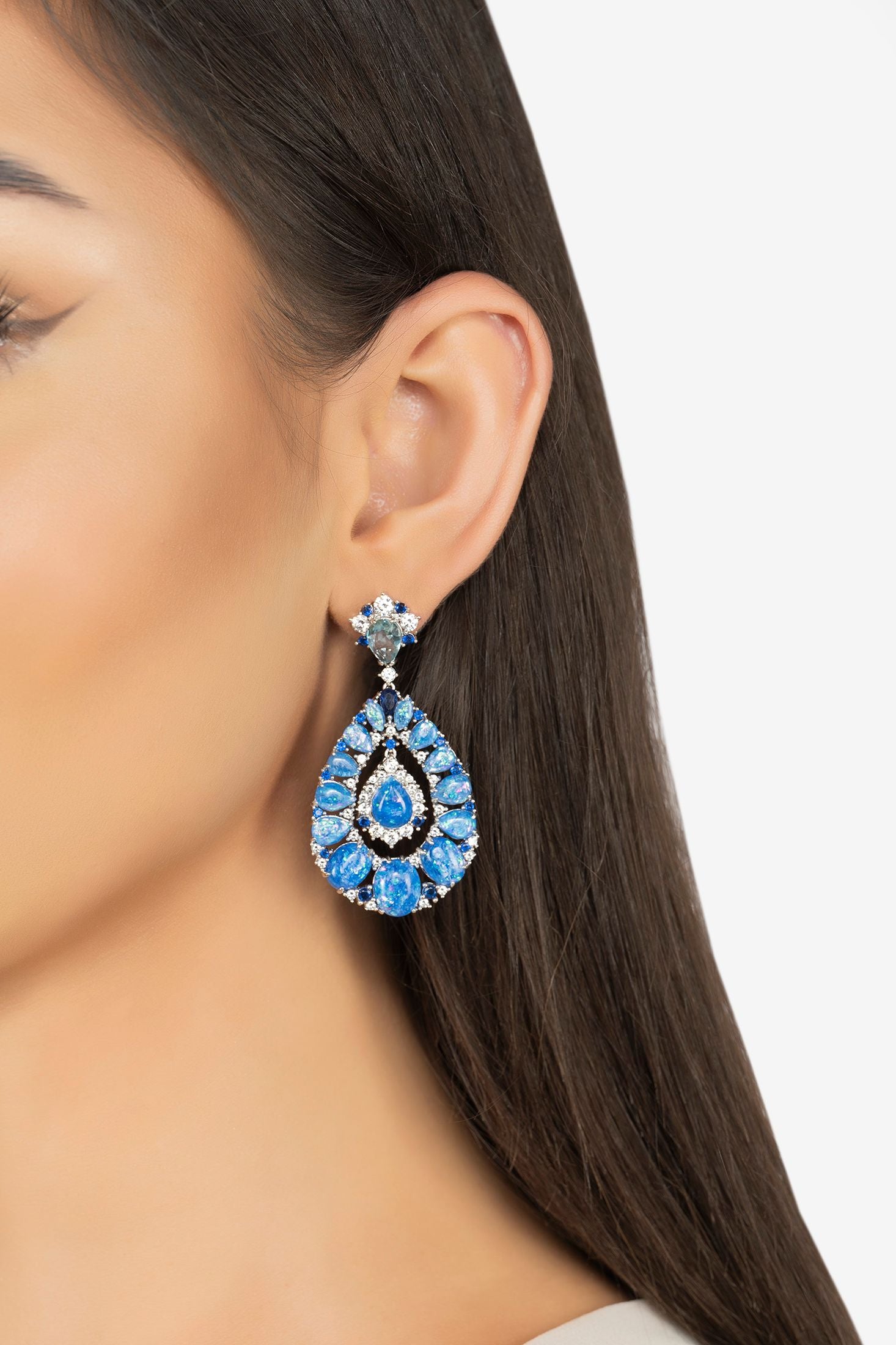 The earring worn by a model.
