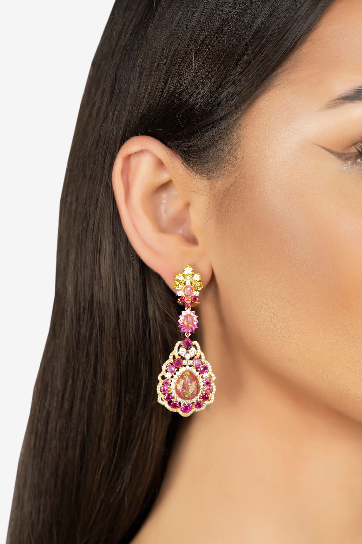 The earring worn by a model.