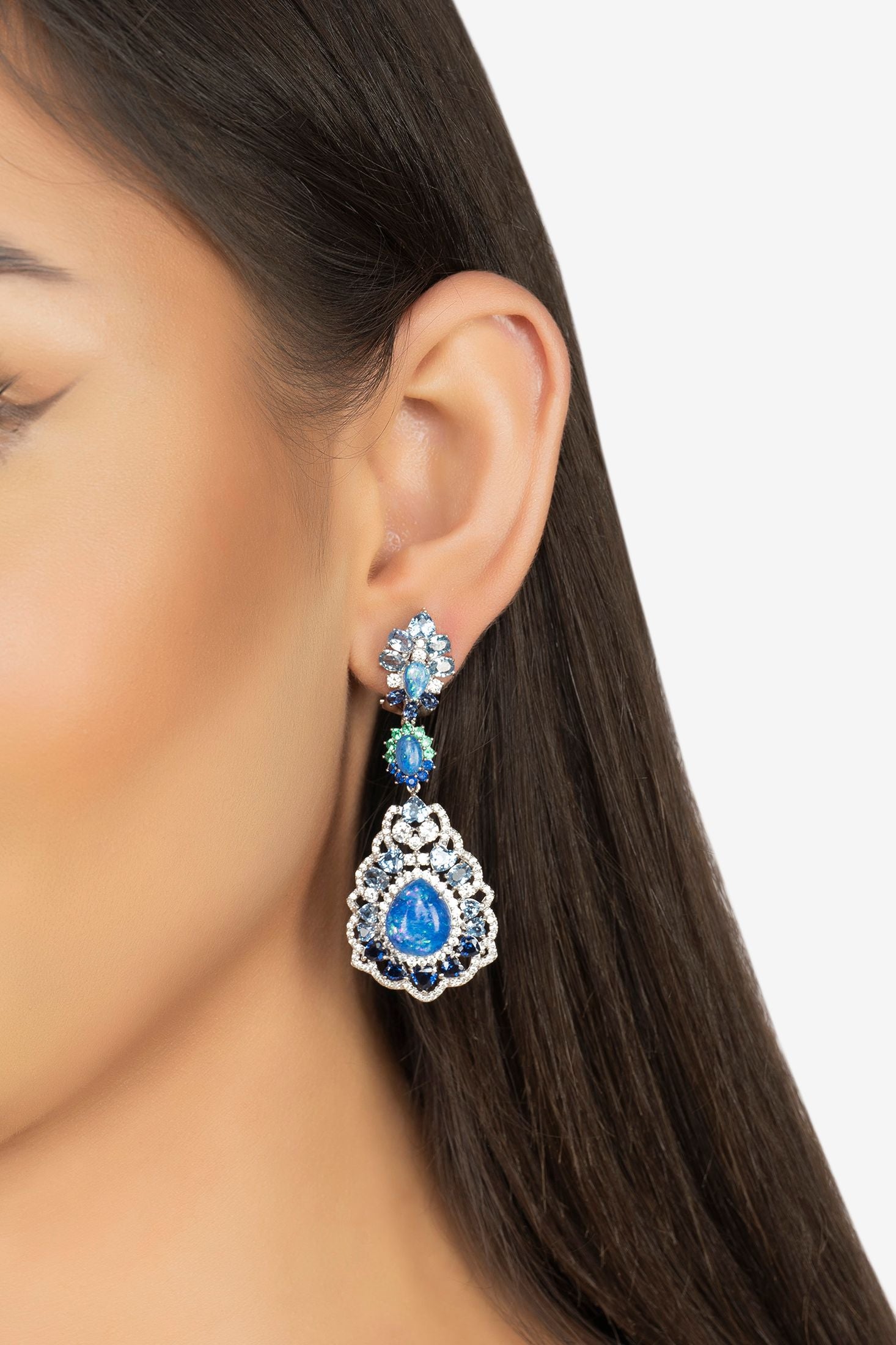 The earring worn by a model.