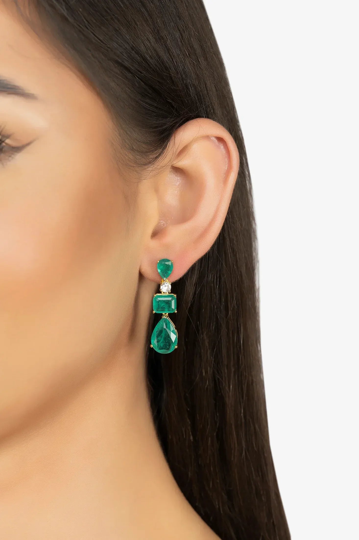 The earring worn by a model.