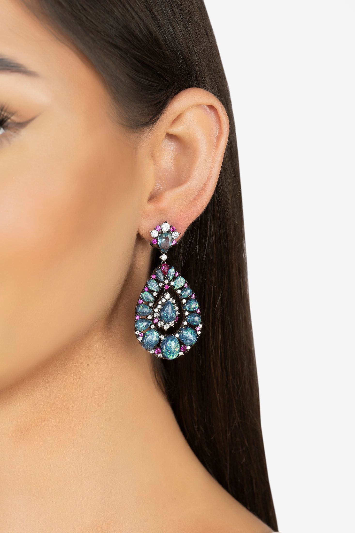 The earring worn by a model.