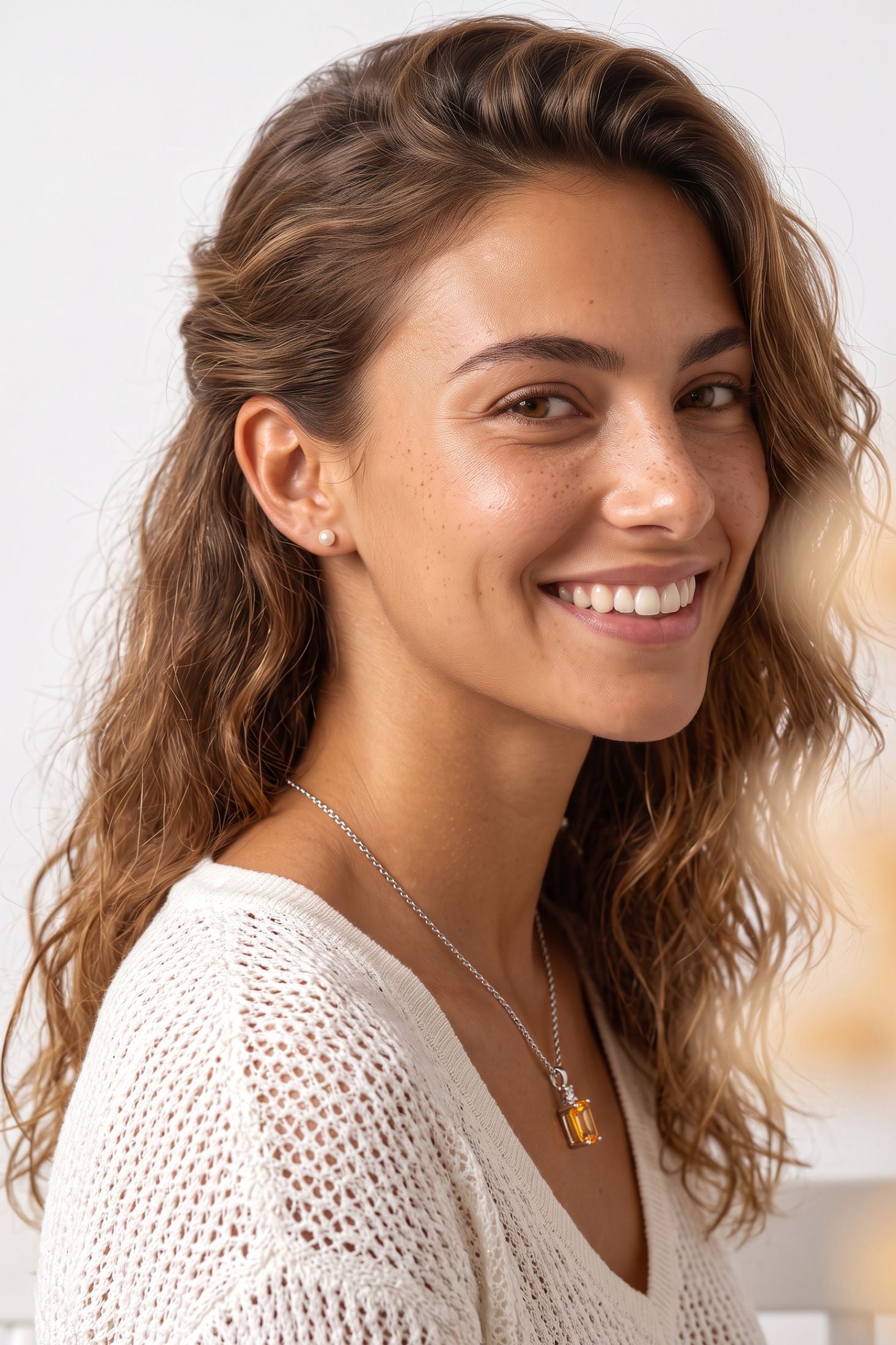 Winslet Yellow Topaz Pendant Necklace Silver worn by a model, showing the pendant scale and how the chain sits.