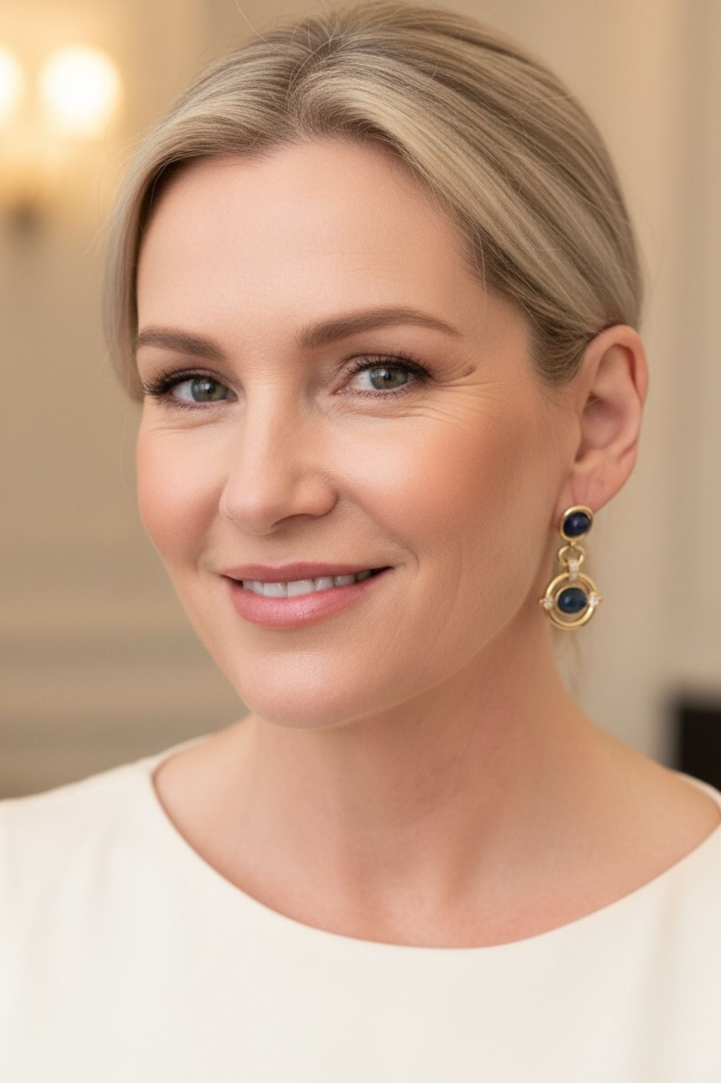 Woman wearing earrings with a blurred background