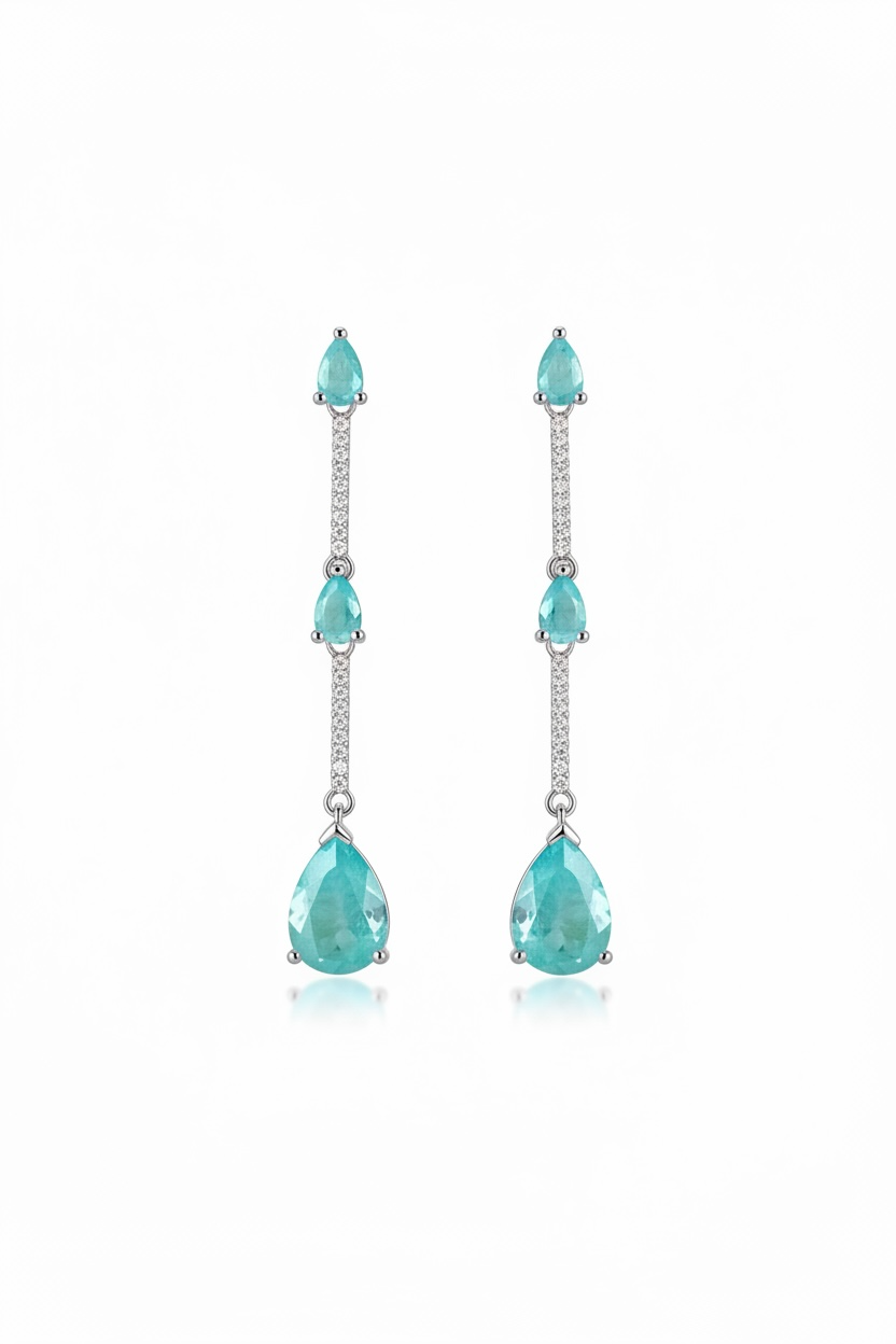 Pair of turquoise drop earrings on a white background