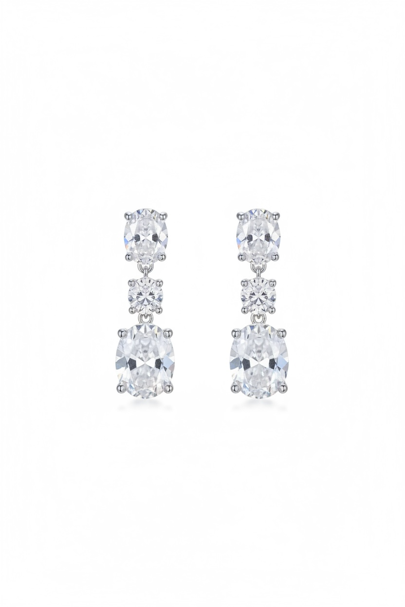 Pair of earrings with clear gemstones on a white background