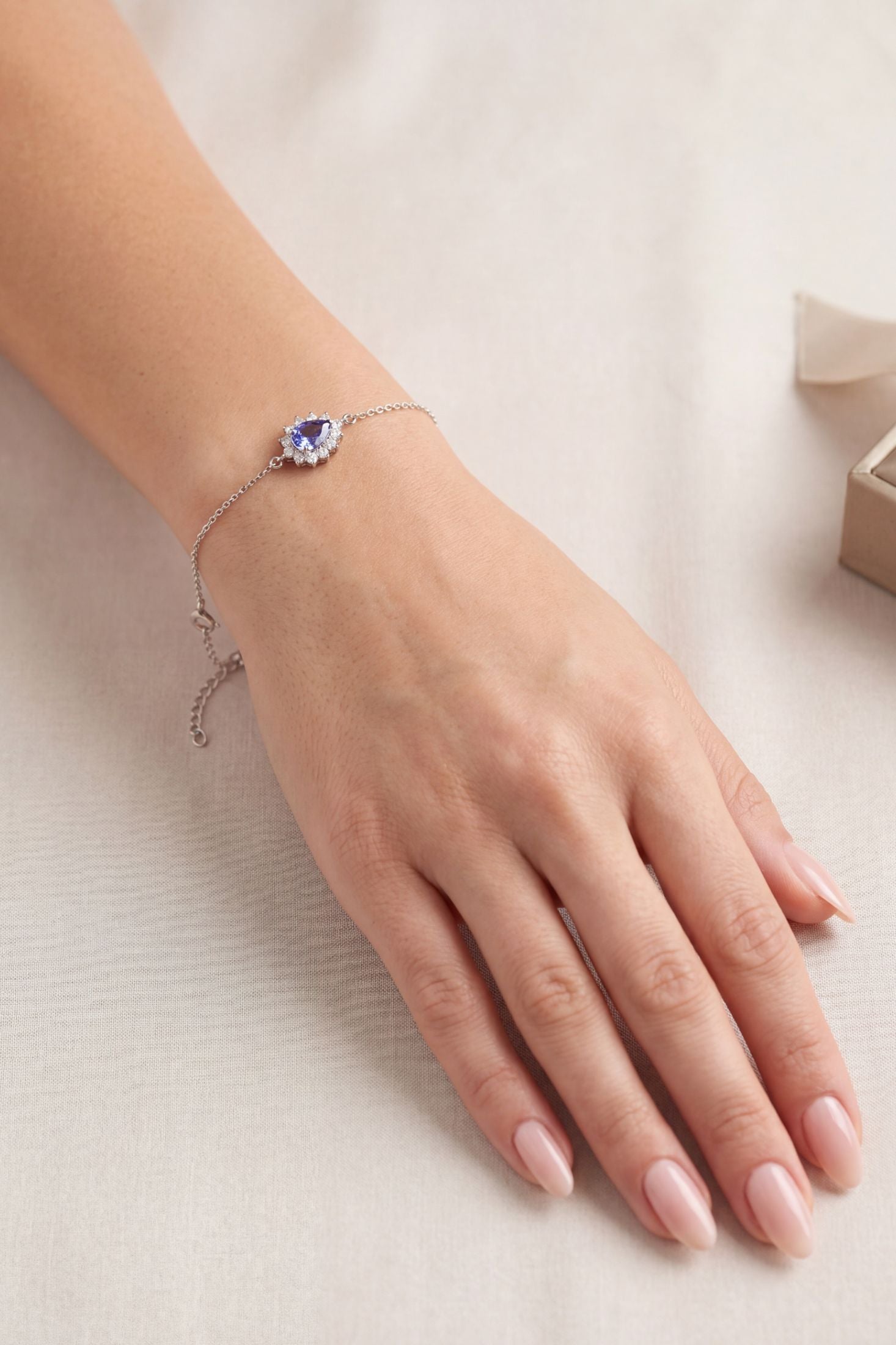 Phillippa Bracelet Tanzanite Silver worn by a model, showing how it fits on the wrist and its scale.