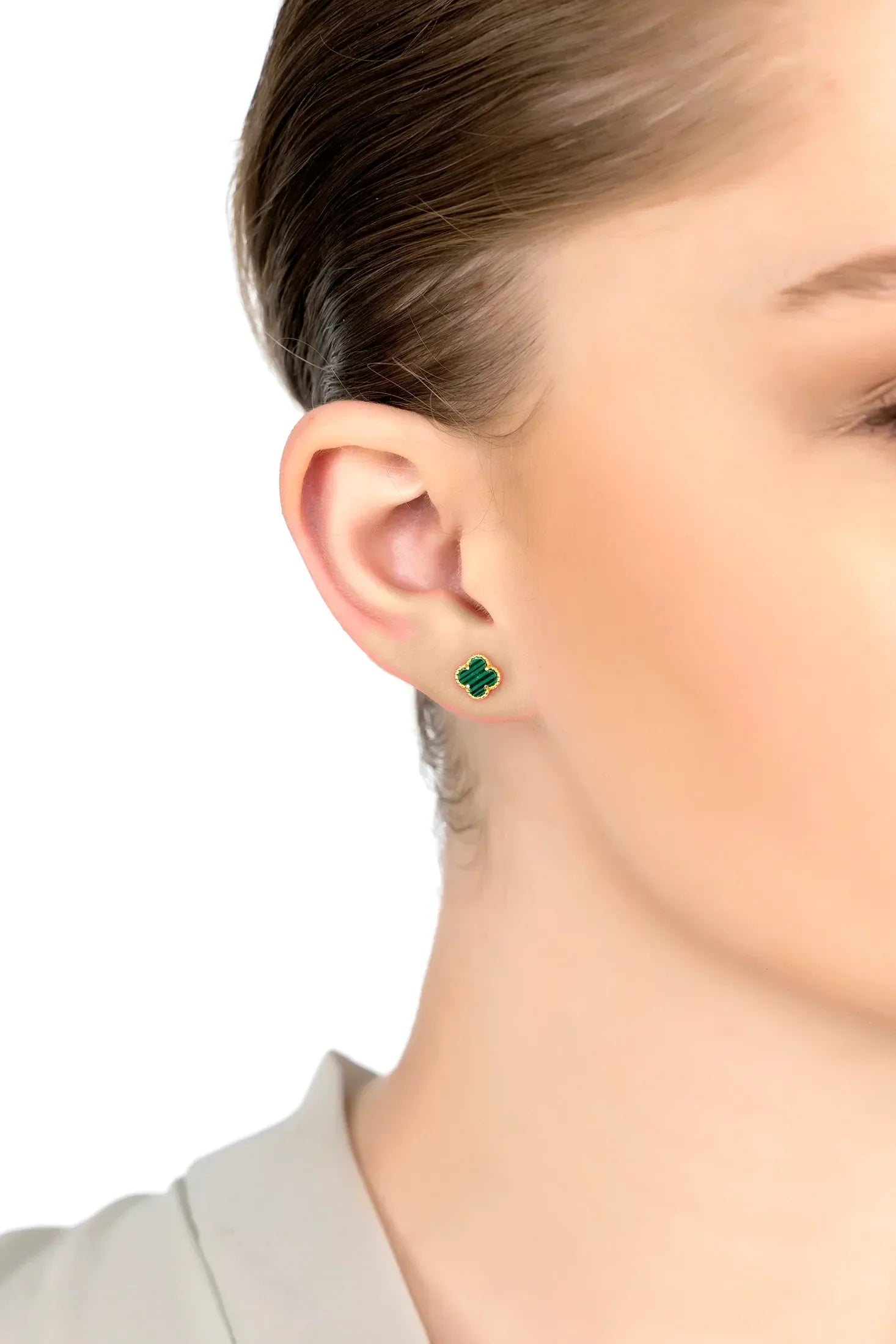The earring worn by a model.