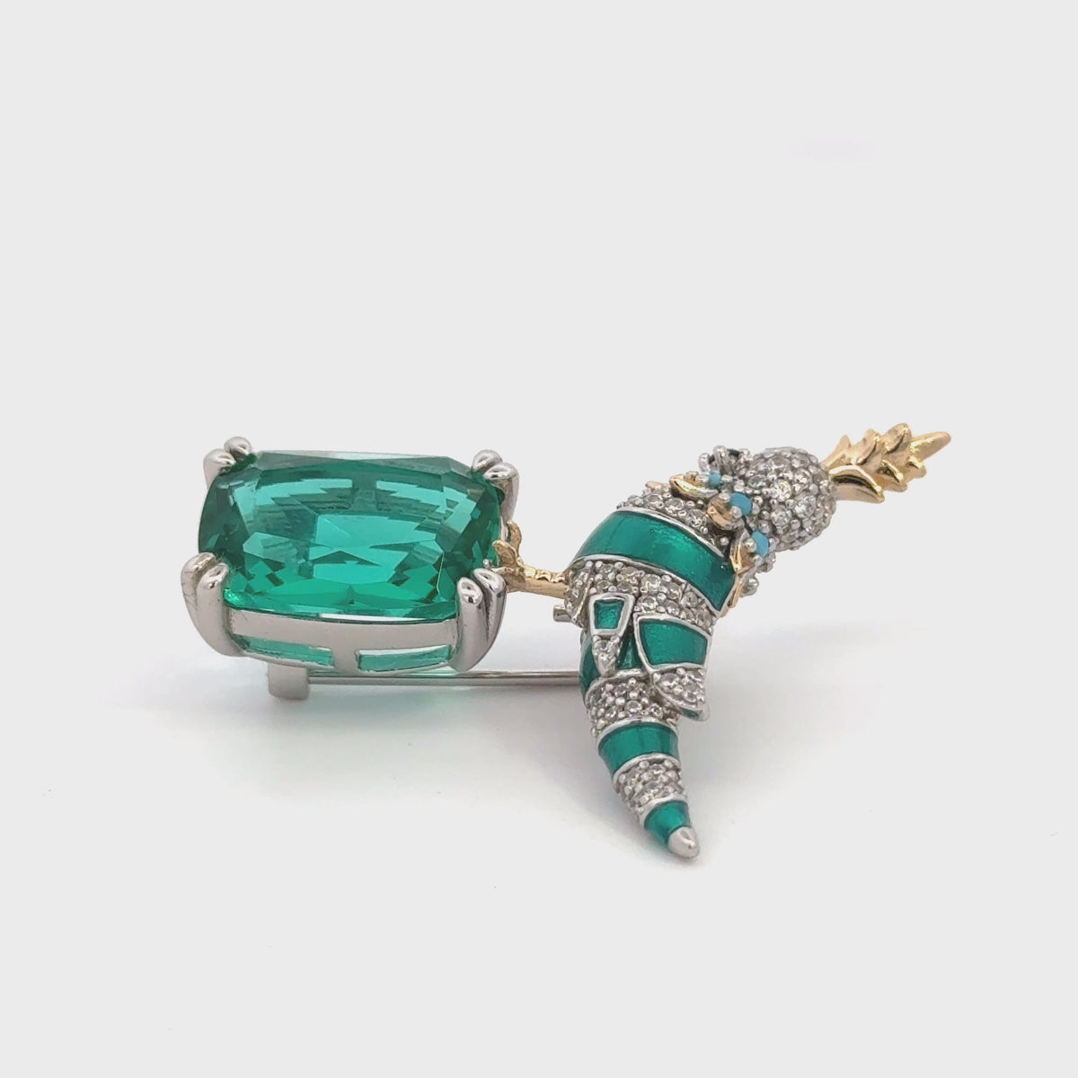 Rotating display the brooch.