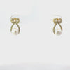 Video of Bows And Pearls Earrings Gold, showing the drop, movement and scale from multiple angles.