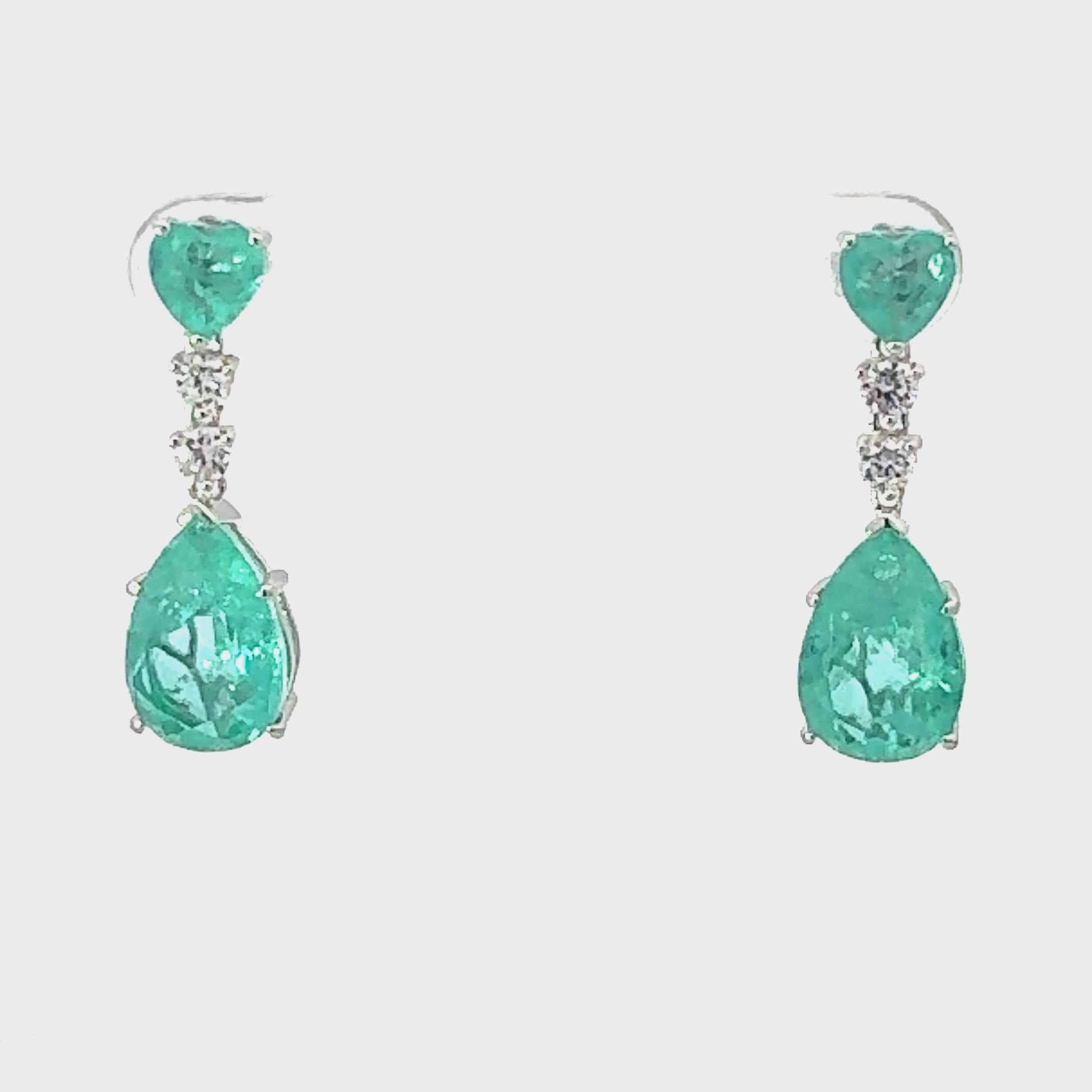 Video of Augusta Paraiba Tourmaline Teardrop Earrings Silver, showing the drop, movement and scale from multiple angles.