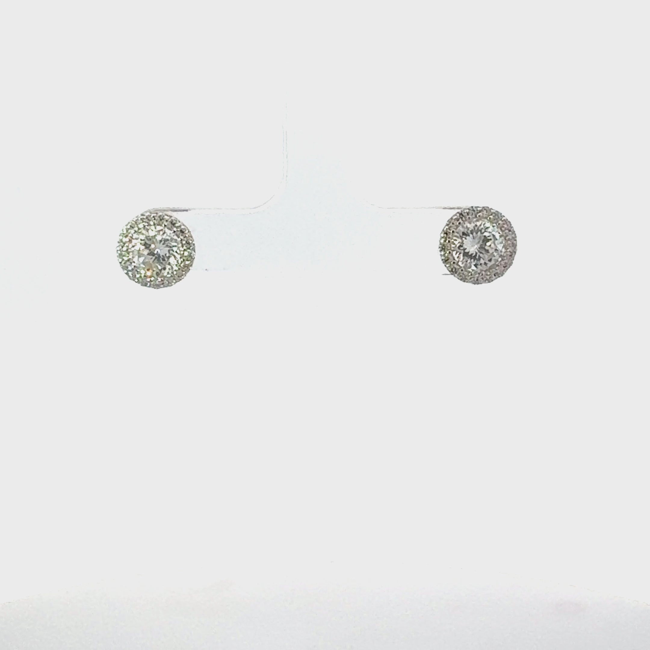 Video of Aspen Moissanite Stud Earrings Silver, showing the drop, movement and scale from multiple angles.