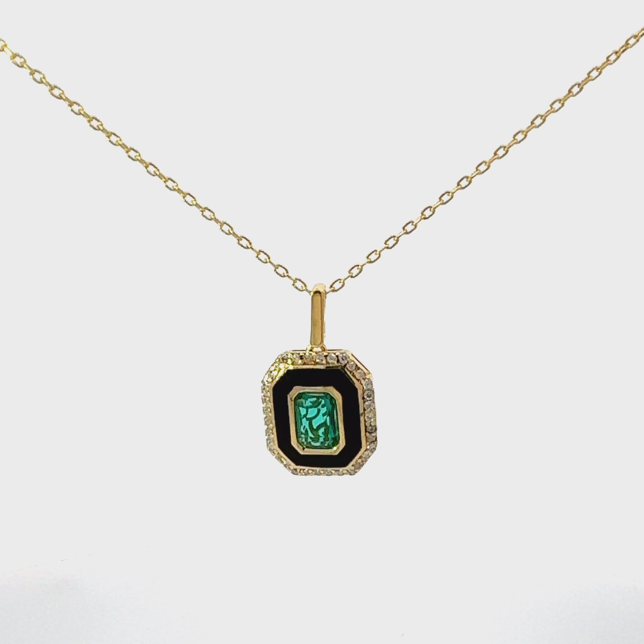 Video of Art Deco Emerald And Enamel Pendant Necklace Gold, showing the pendant, chain and scale from multiple angles.