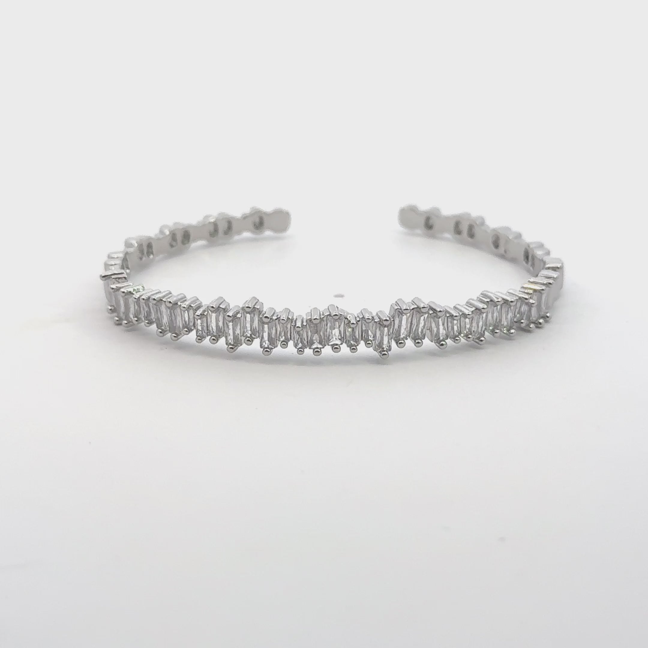 Video of Baguette Ice Cuff Bangle Silver White, showing the fit, detailing and movement from multiple angles.