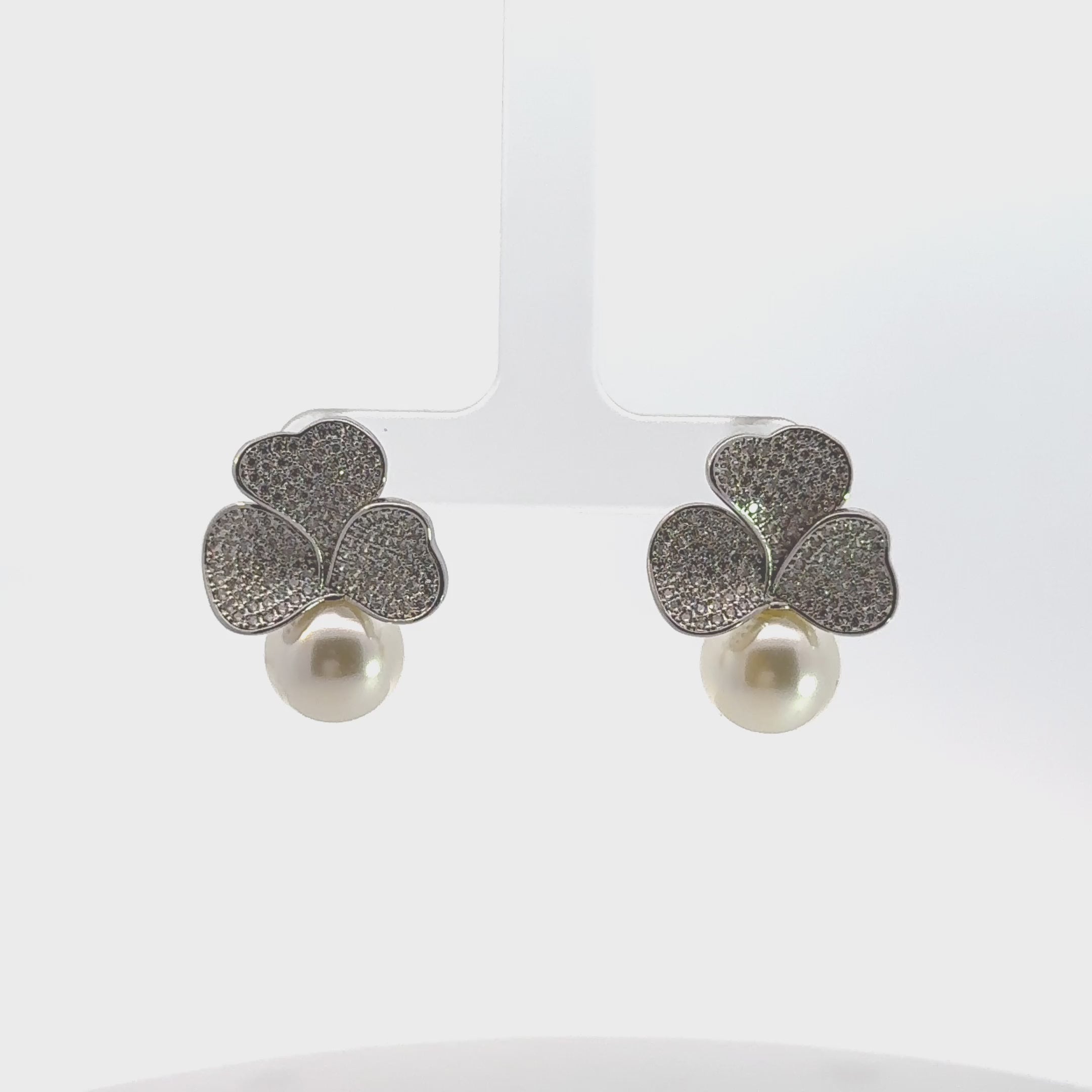 Video of Shamrock Majorica Pearl Drop Earrings Silver, showing the drop, movement and scale from multiple angles.
