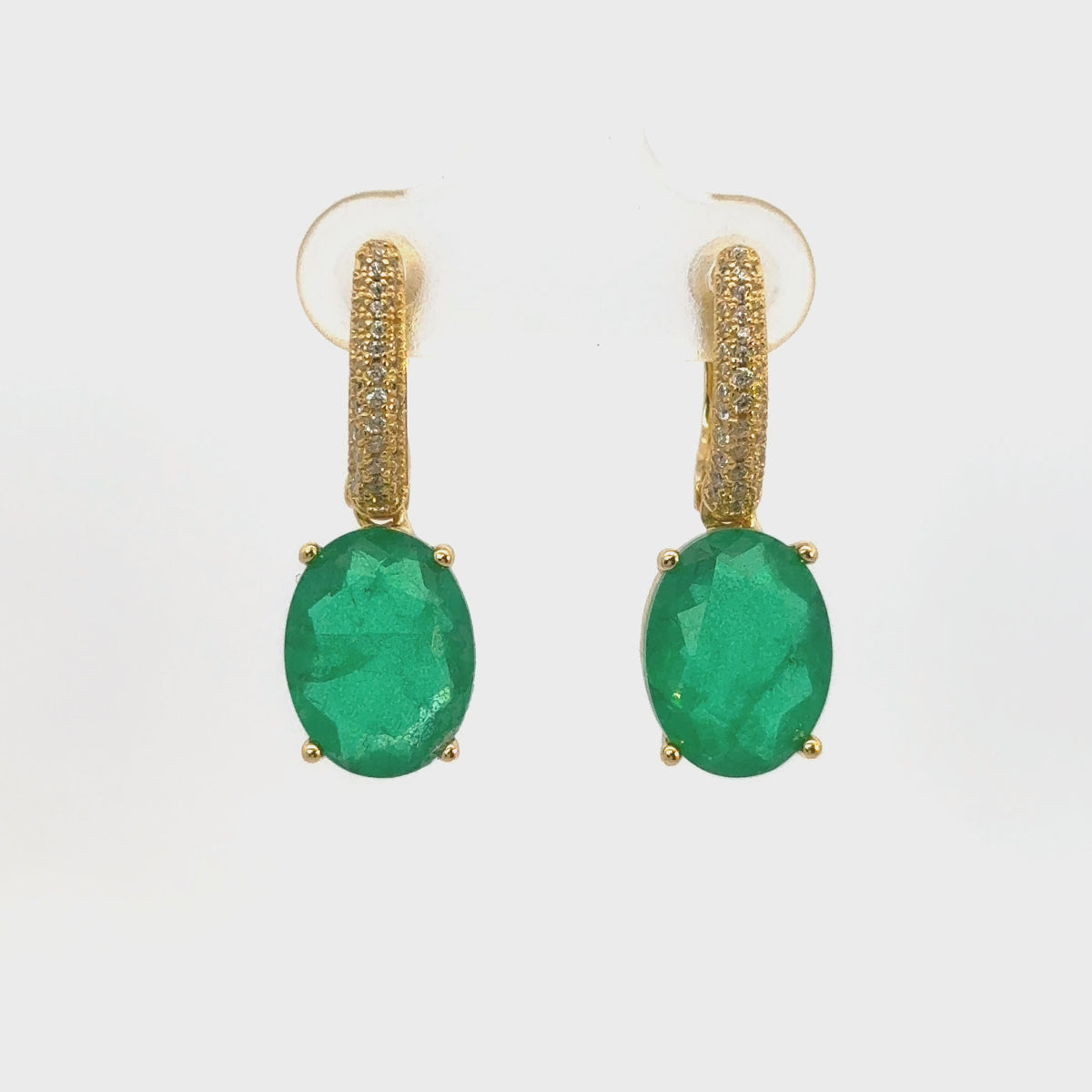 Rotating display the earrings.