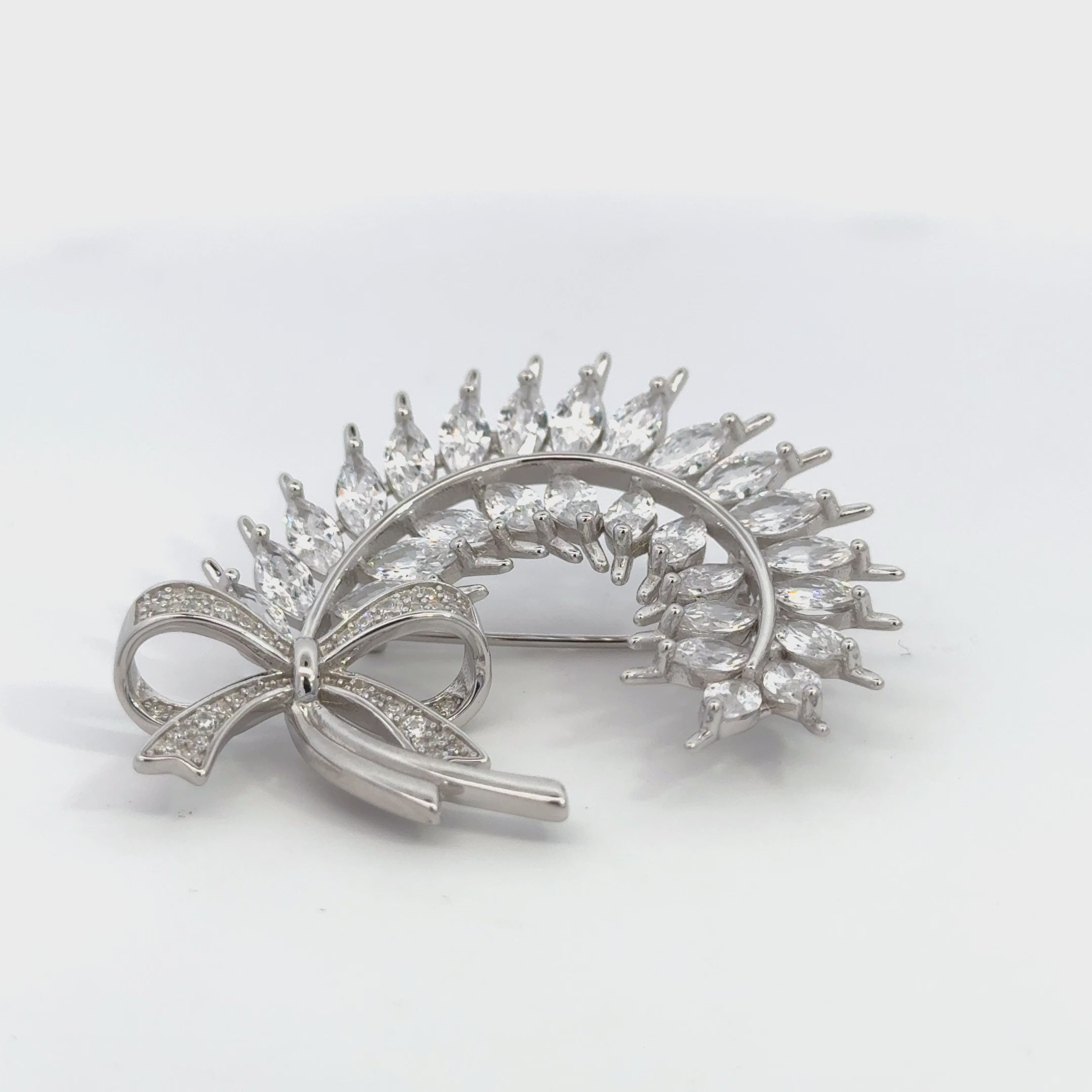 Rotating display the brooch.