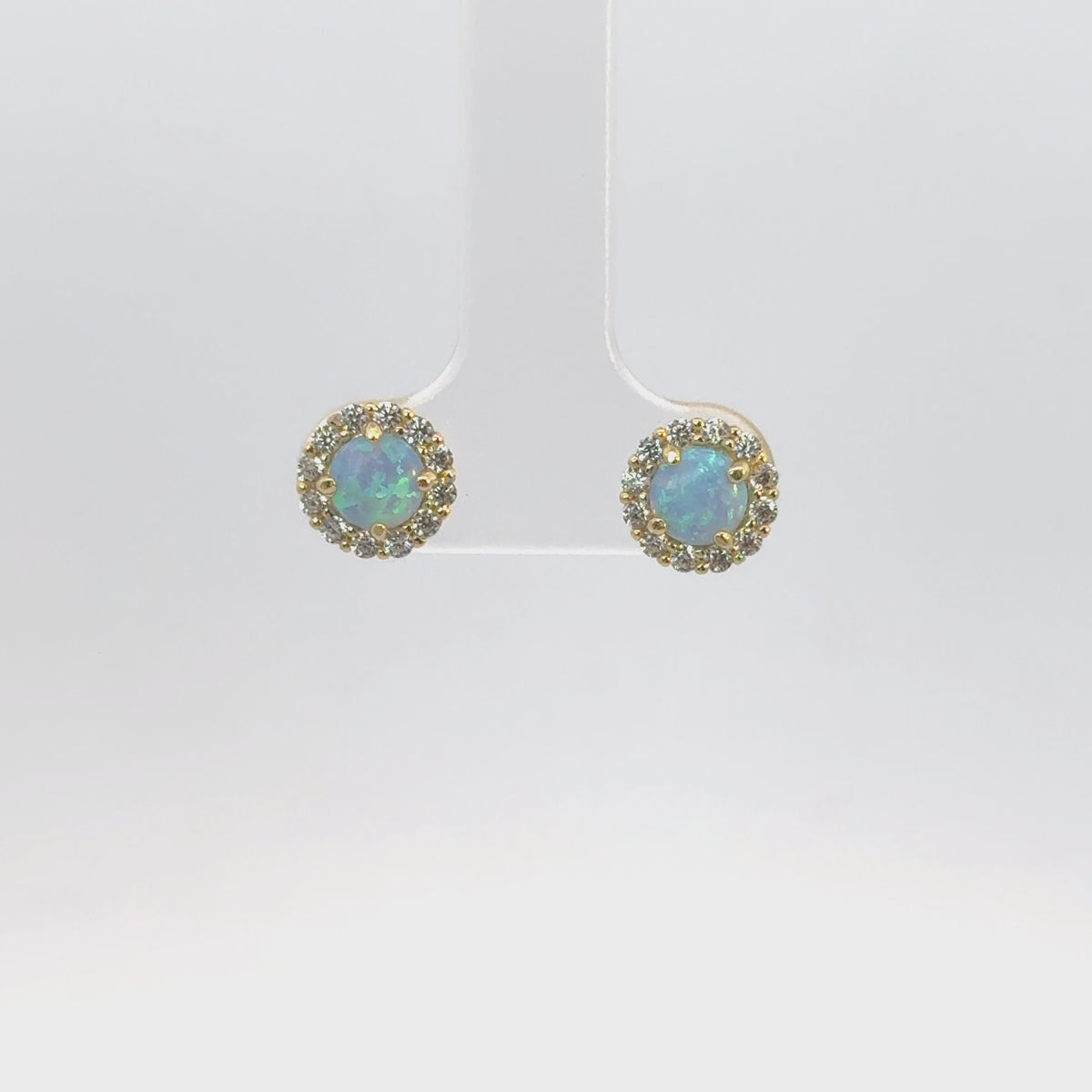 Rotating display the earrings.