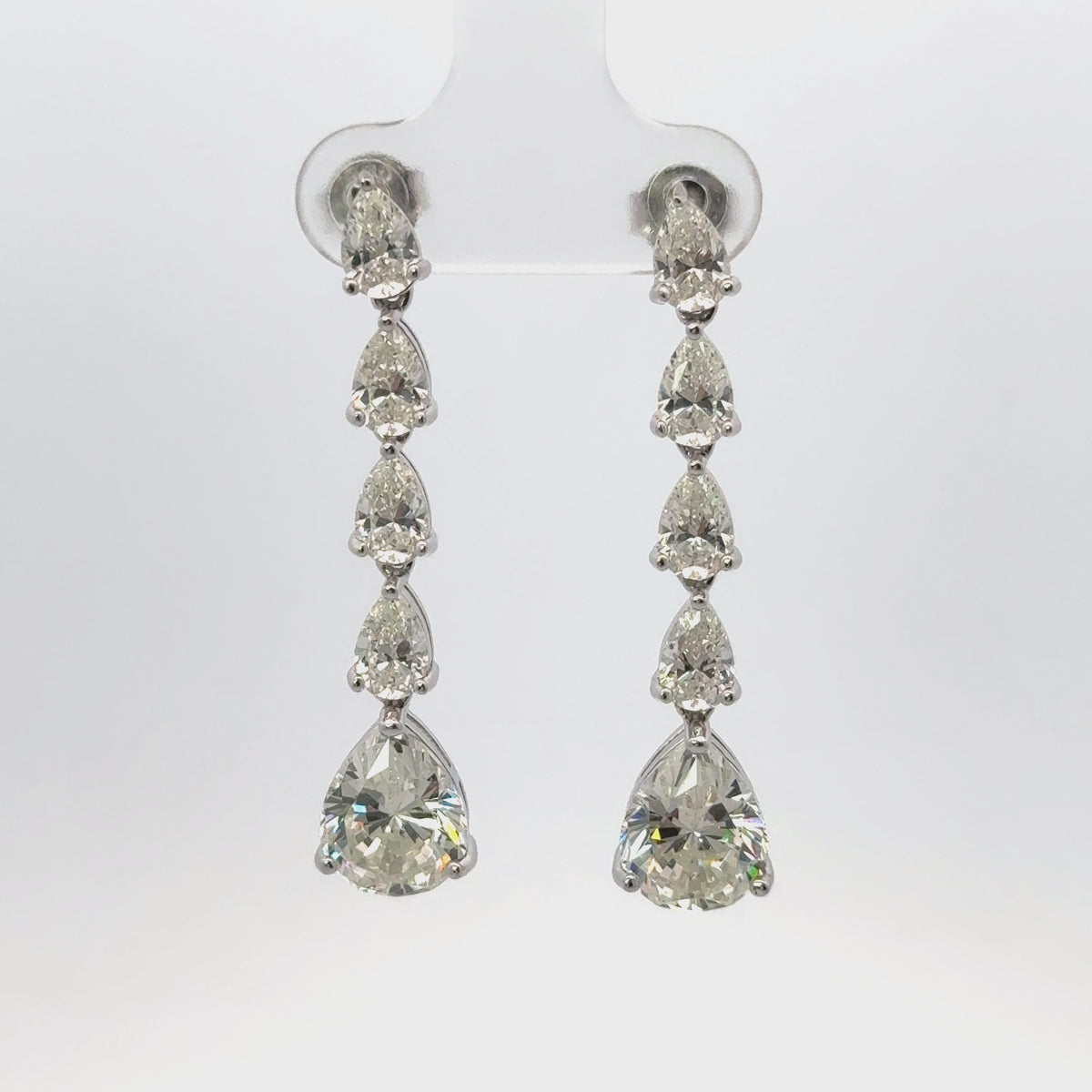 Rotating display the earrings.