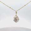 Video of Polka Dot Baroque Pearl Pendant Necklace Gold Cz, showing the pendant, chain and scale from multiple angles.